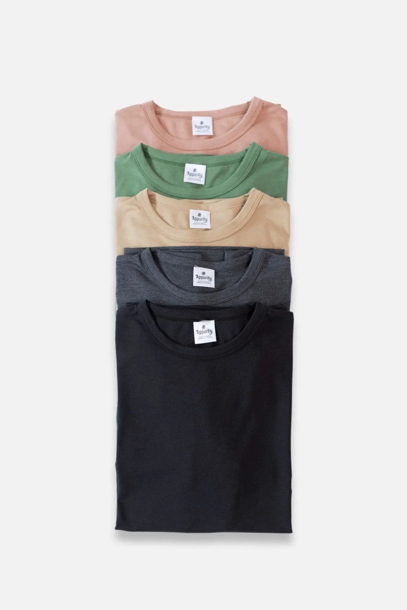 Stack of men's bamboo t-shirts in black, gray, beige, green, and pink on white background