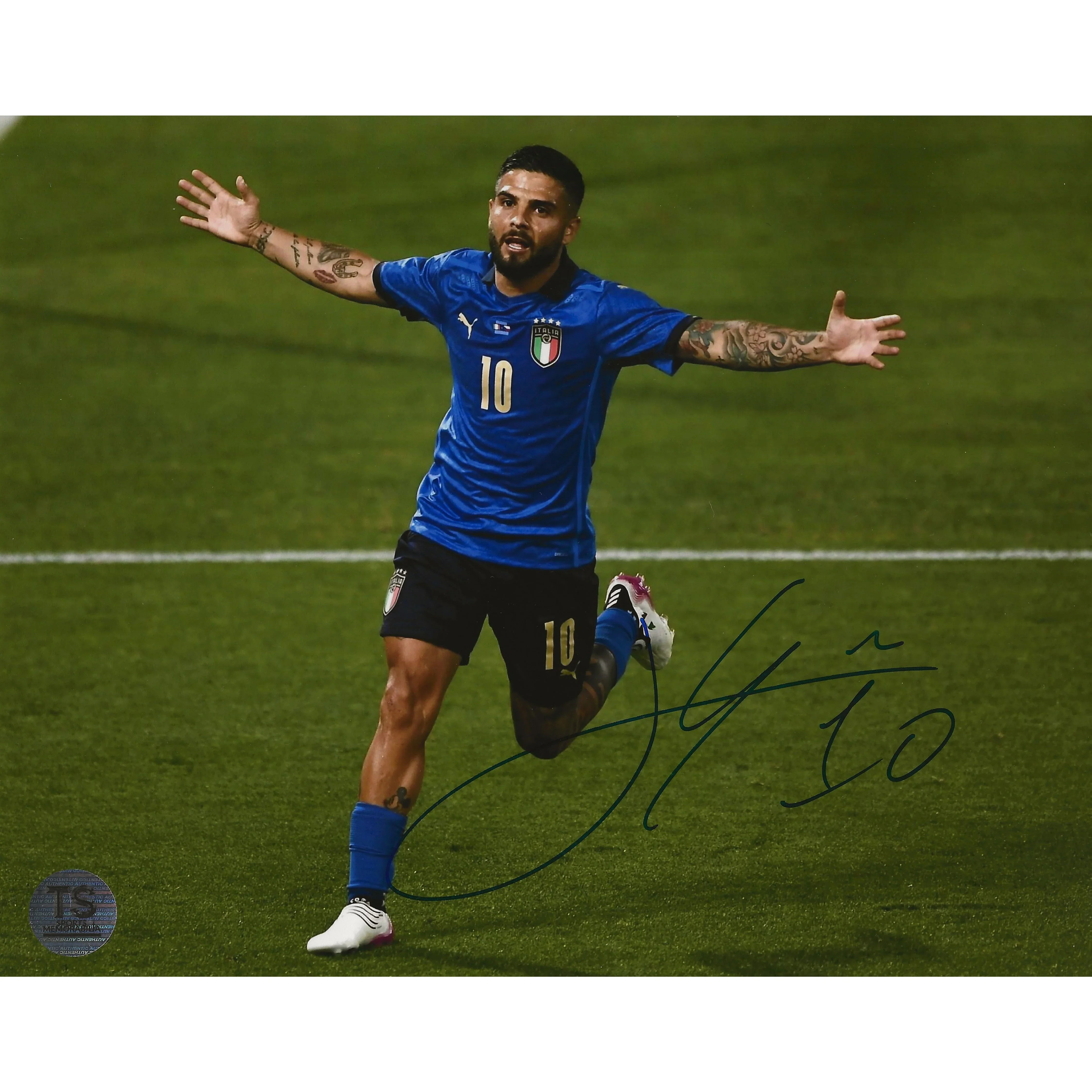 Italian soccer player in blue jersey number 10 celebrating a goal on the field
