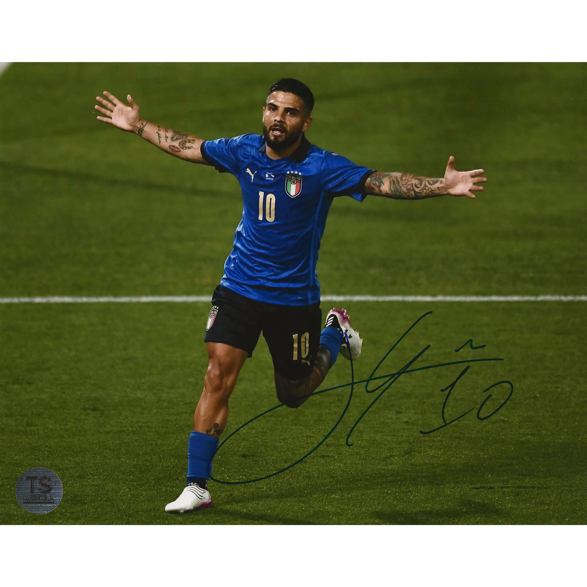 Italian soccer player in blue jersey number 10 celebrating a goal on the field