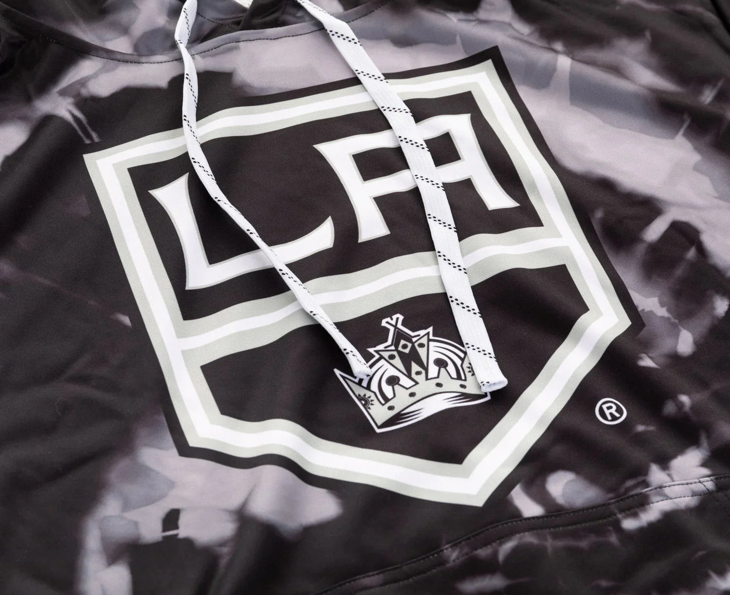 Close-up of LA logo sublimation hoodie with drawstrings, black and gray crown design