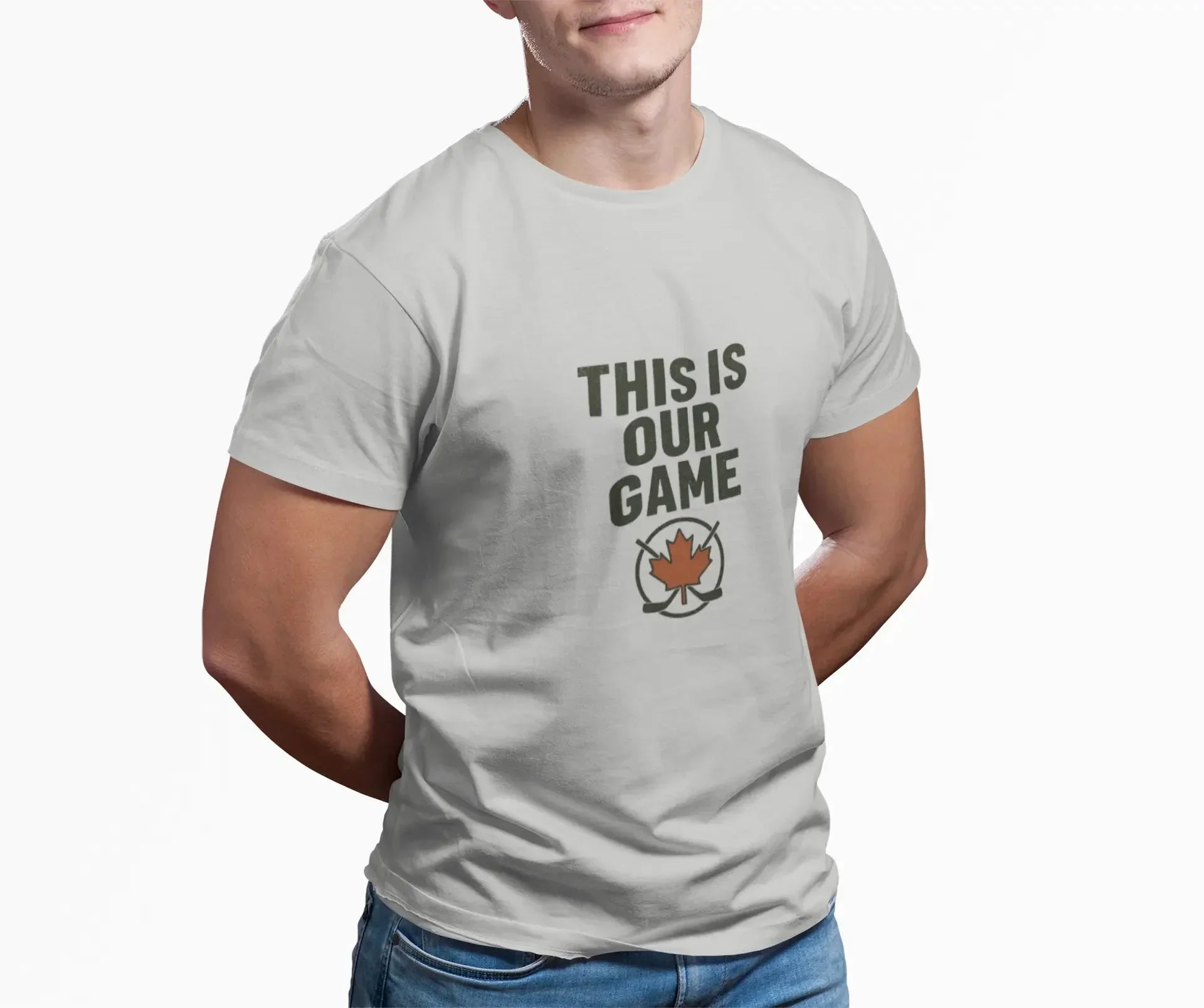 Man wearing a white t-shirt with 'This Is Our Game' text and a maple leaf hockey graphic