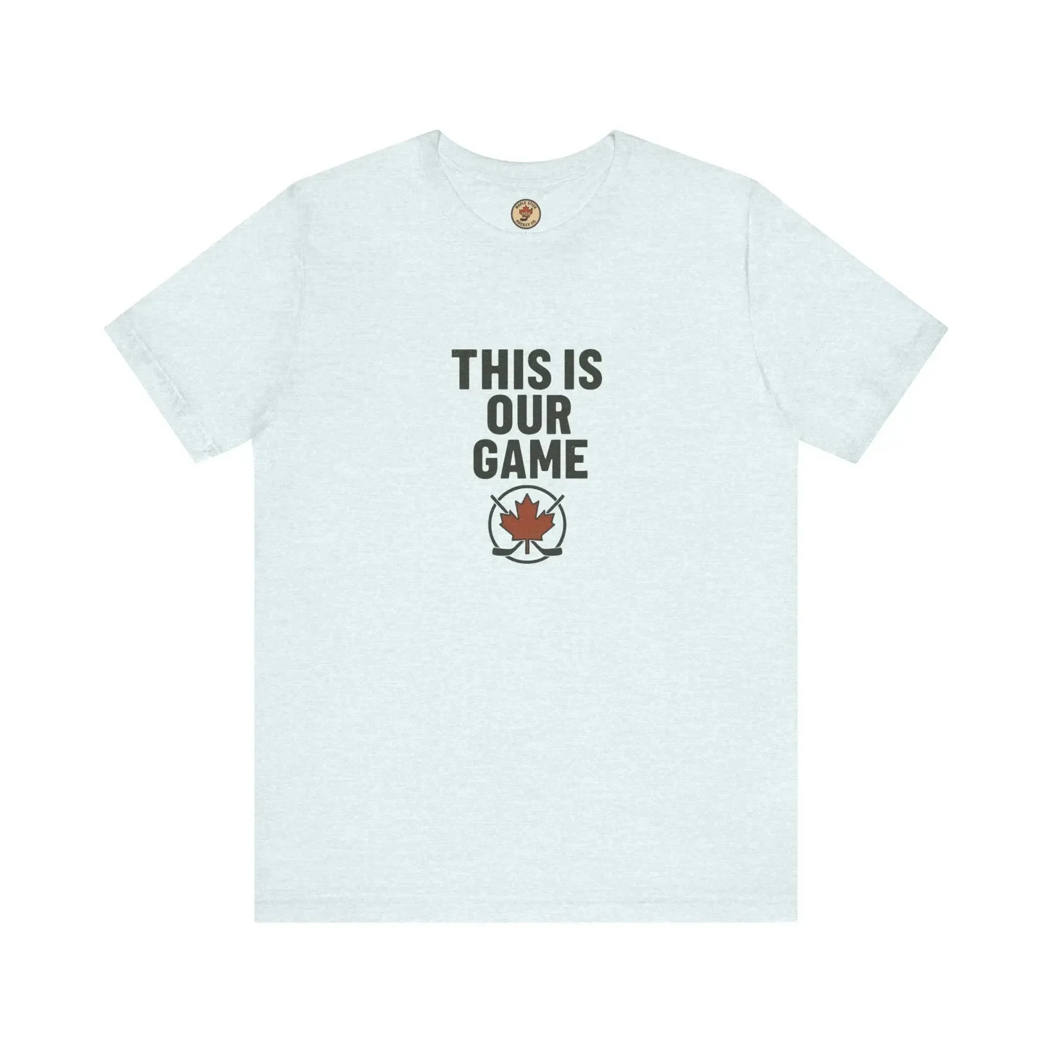 White t-shirt with 'THIS IS OUR GAME' text and maple leaf hockey logo on front