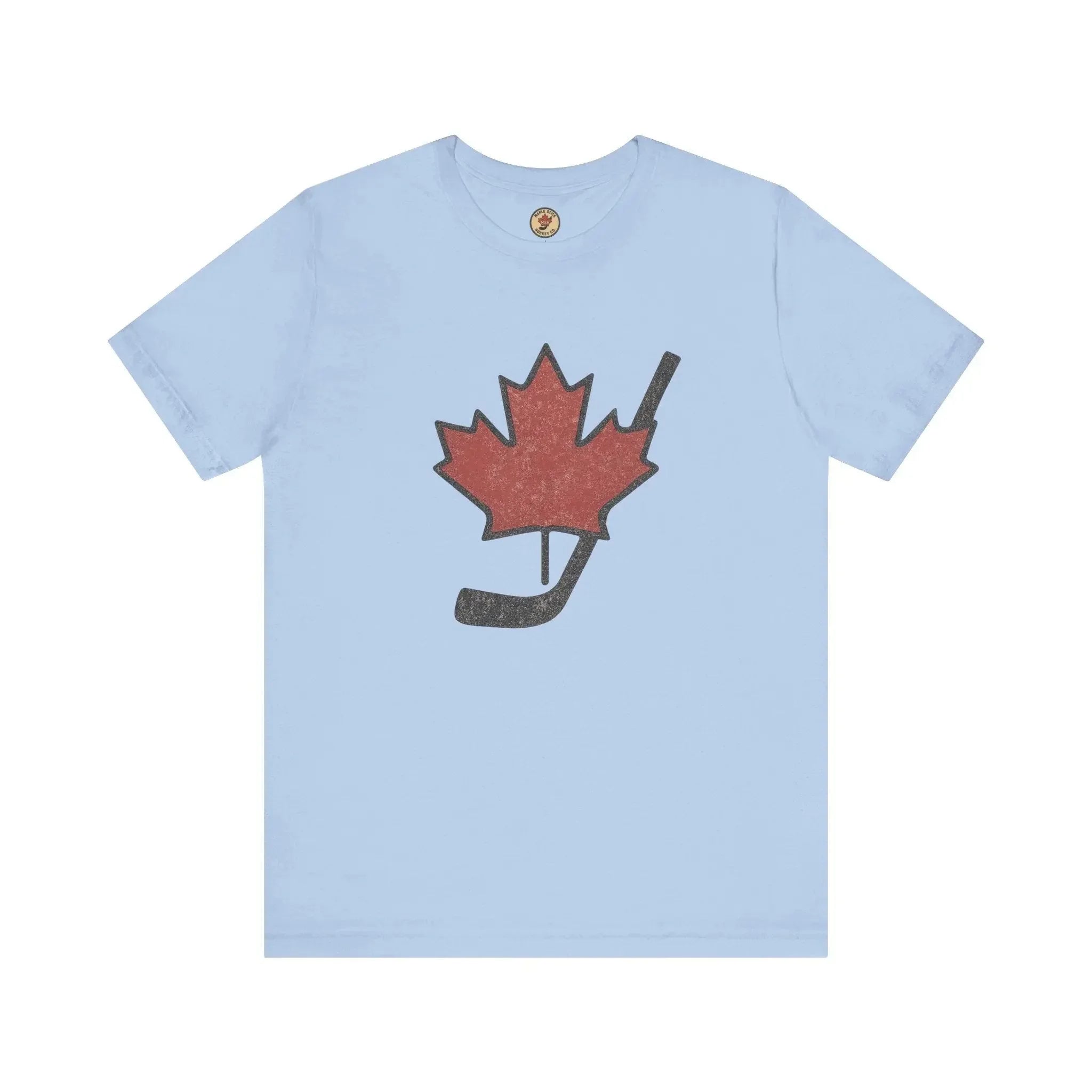 Light blue t-shirt with red maple leaf and black hockey stick graphic