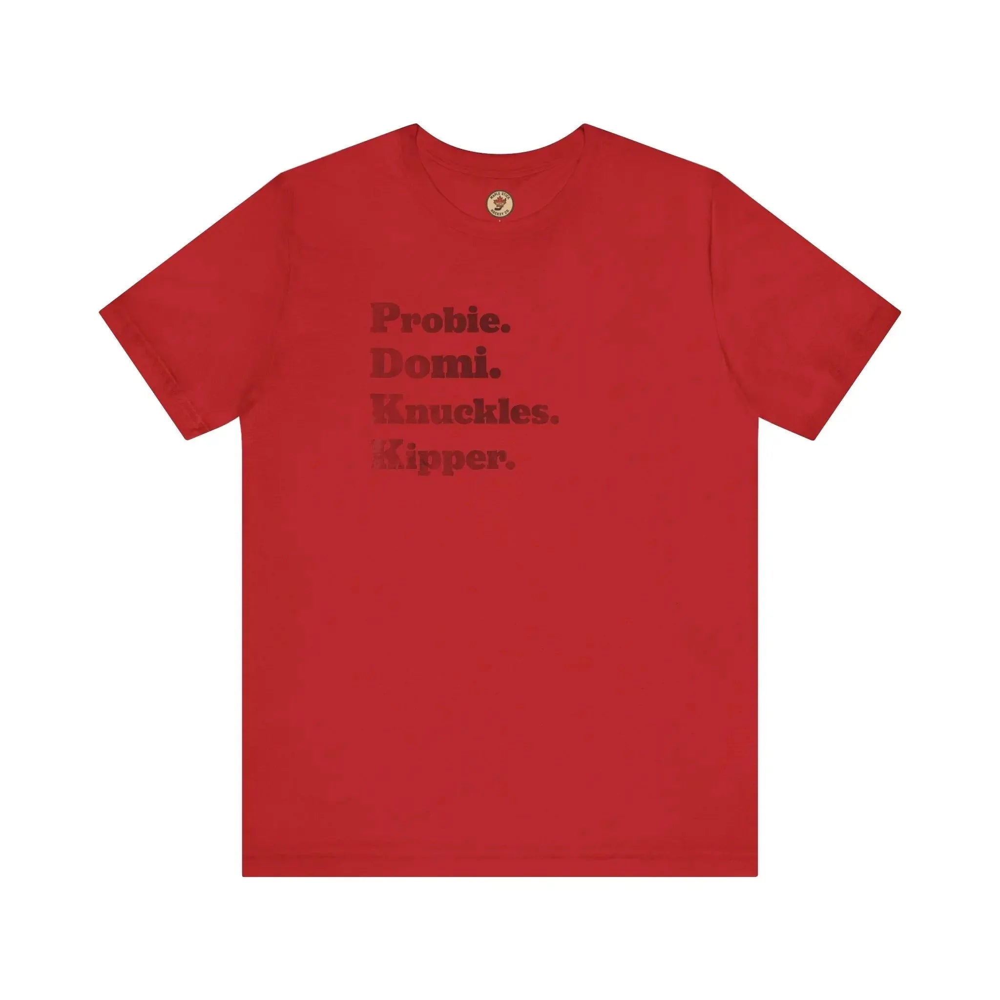 Red t-shirt with bold black text reading Probie. Domi. Knuckles. Kipper. on the front.