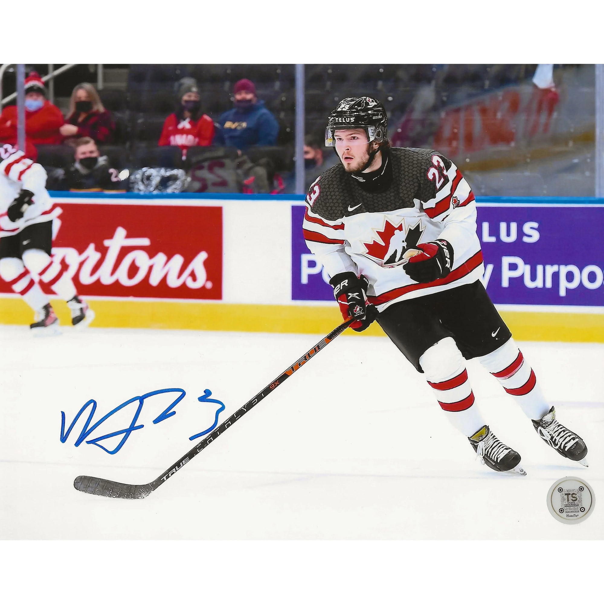 Team Canada ice hockey player in white jersey skating on rink, signed photo, Tim Hortons ad