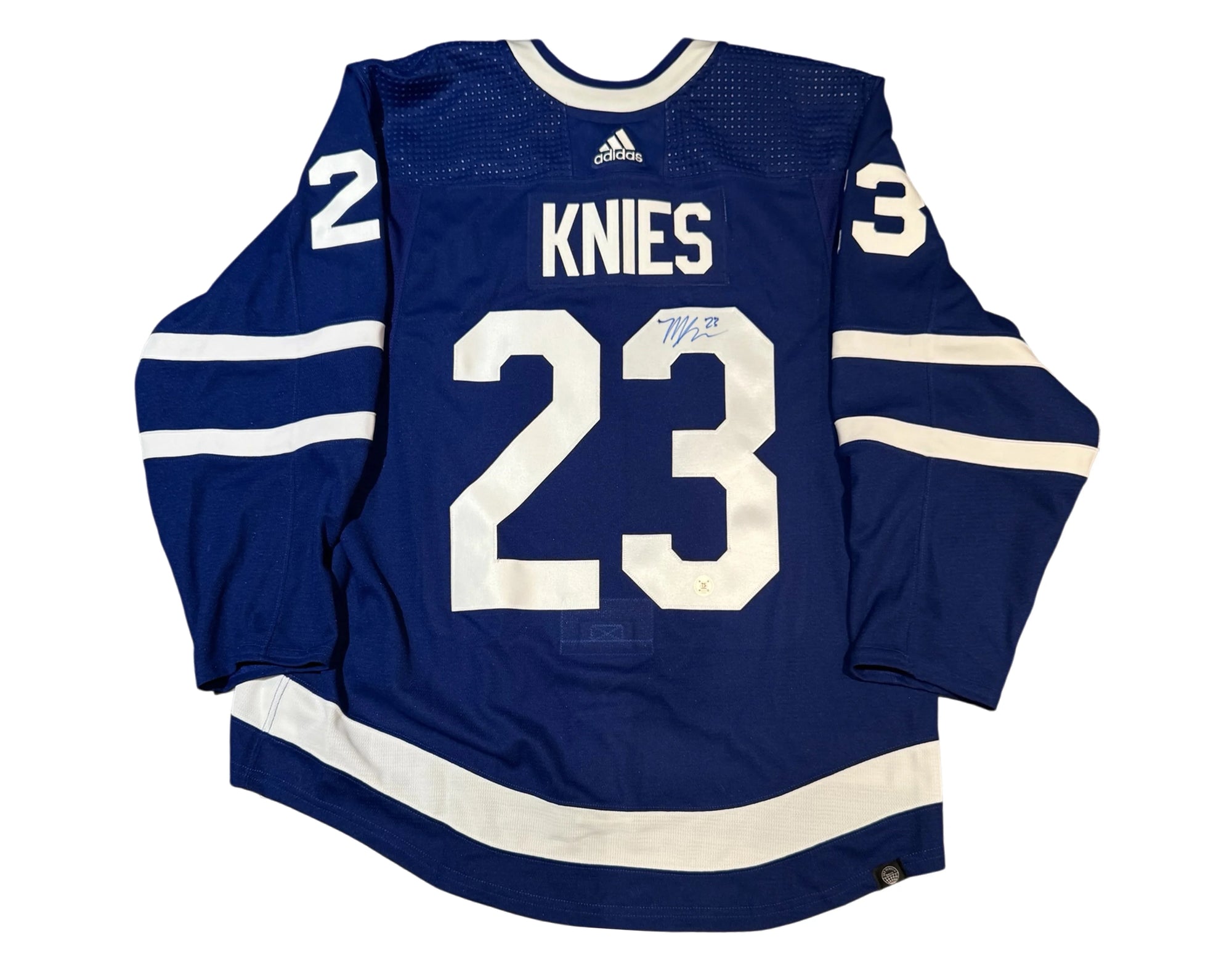 Blue Toronto Maple Leafs jersey number 23 KNIES with white stripes and autograph on back