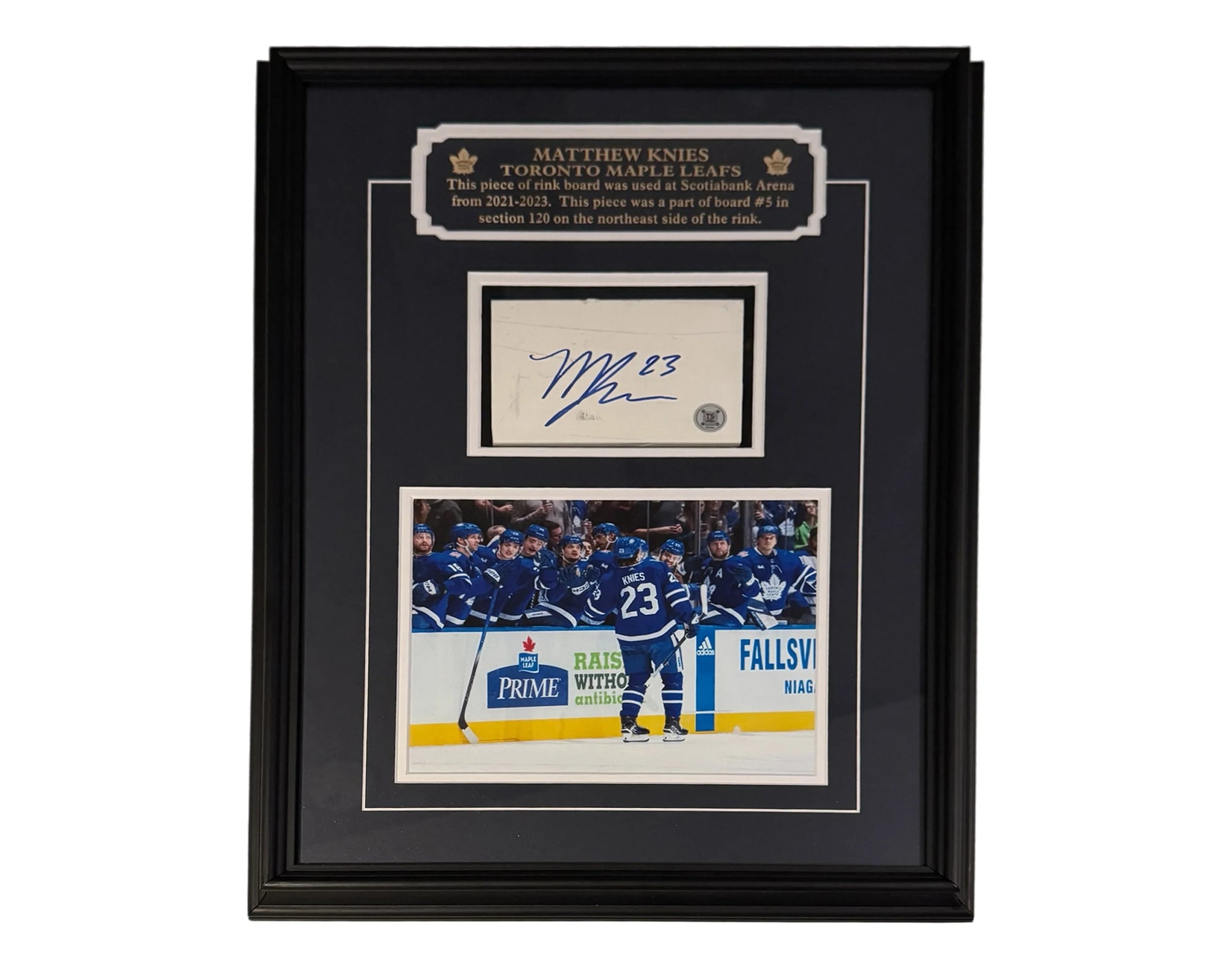 Framed Toronto Maple Leafs memorabilia with signed card and hockey action photo.