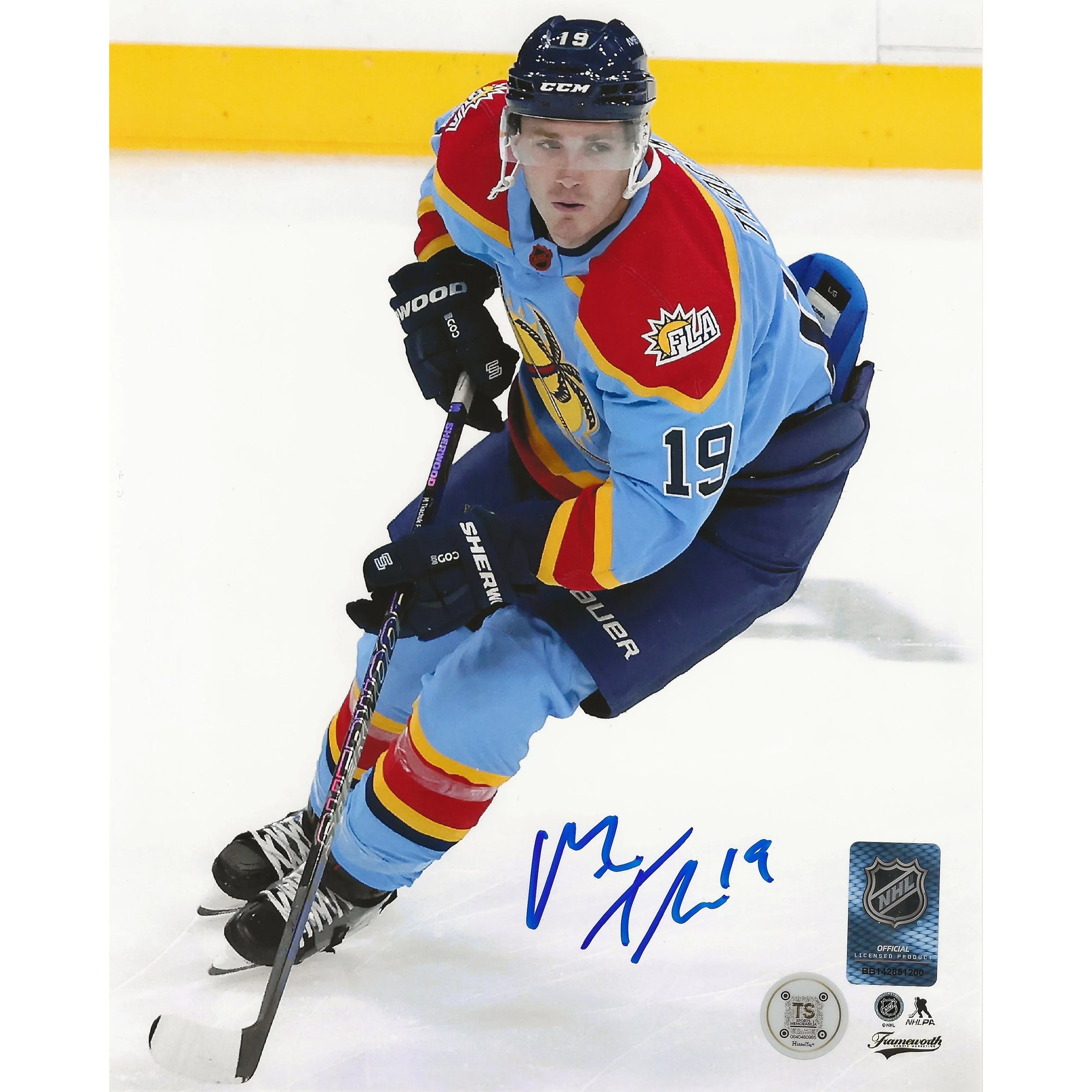 Hockey player in Florida Panthers blue jersey skating on ice, holding stick, with autograph.
