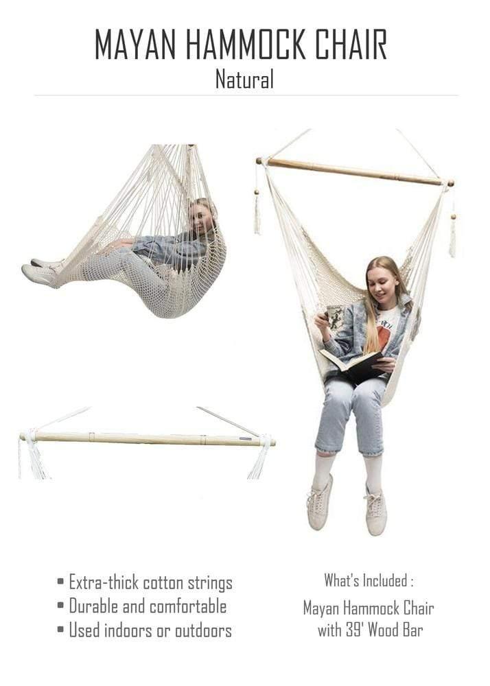 Woman sitting in a cream Mayan hammock chair with wooden bar, reading a book, white background