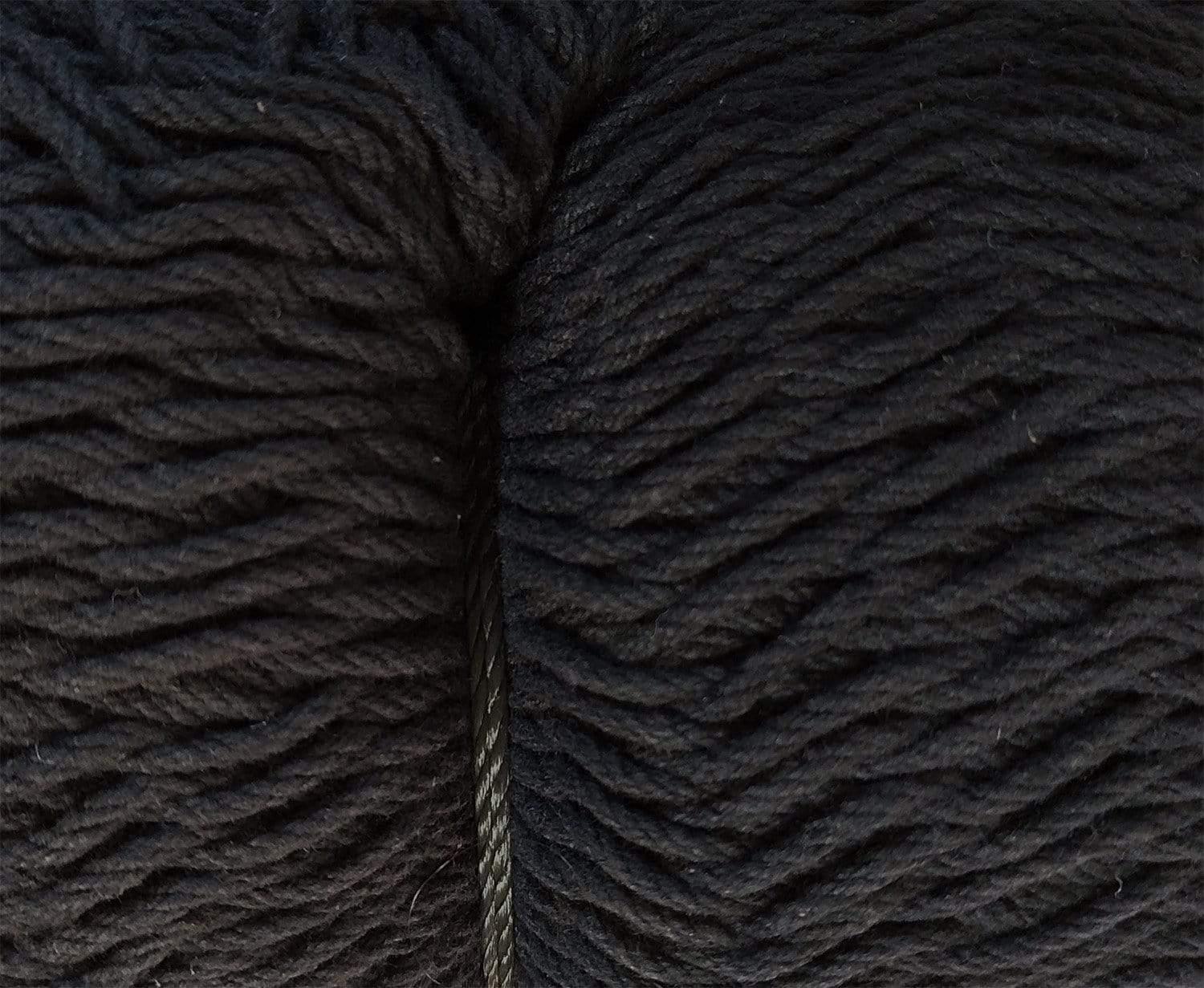 Close-up of black Mayan XL hammock cotton rope texture, tightly braided fiber strands