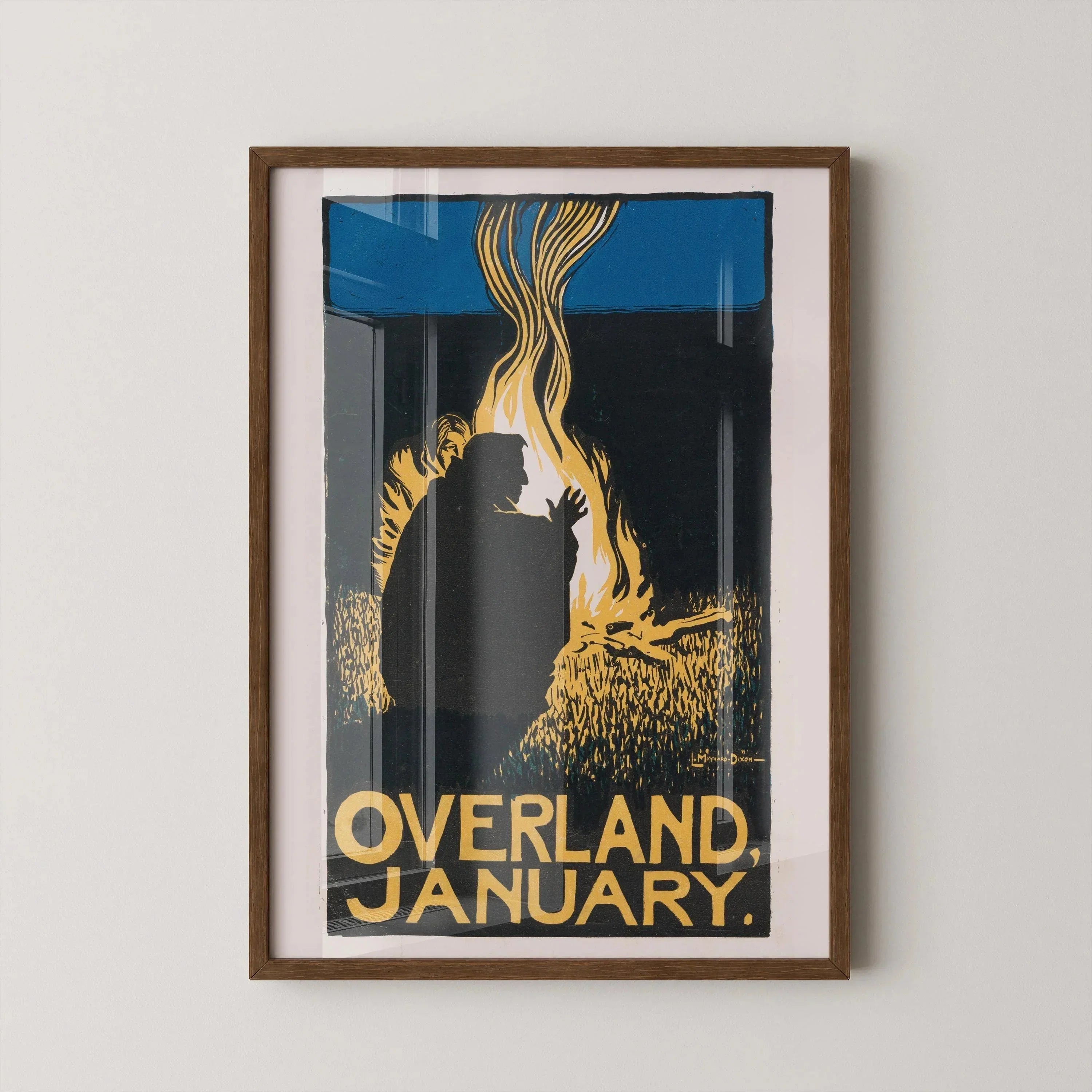 Vintage Overland January magazine cover with silhouette by a campfire and bold yellow text.
