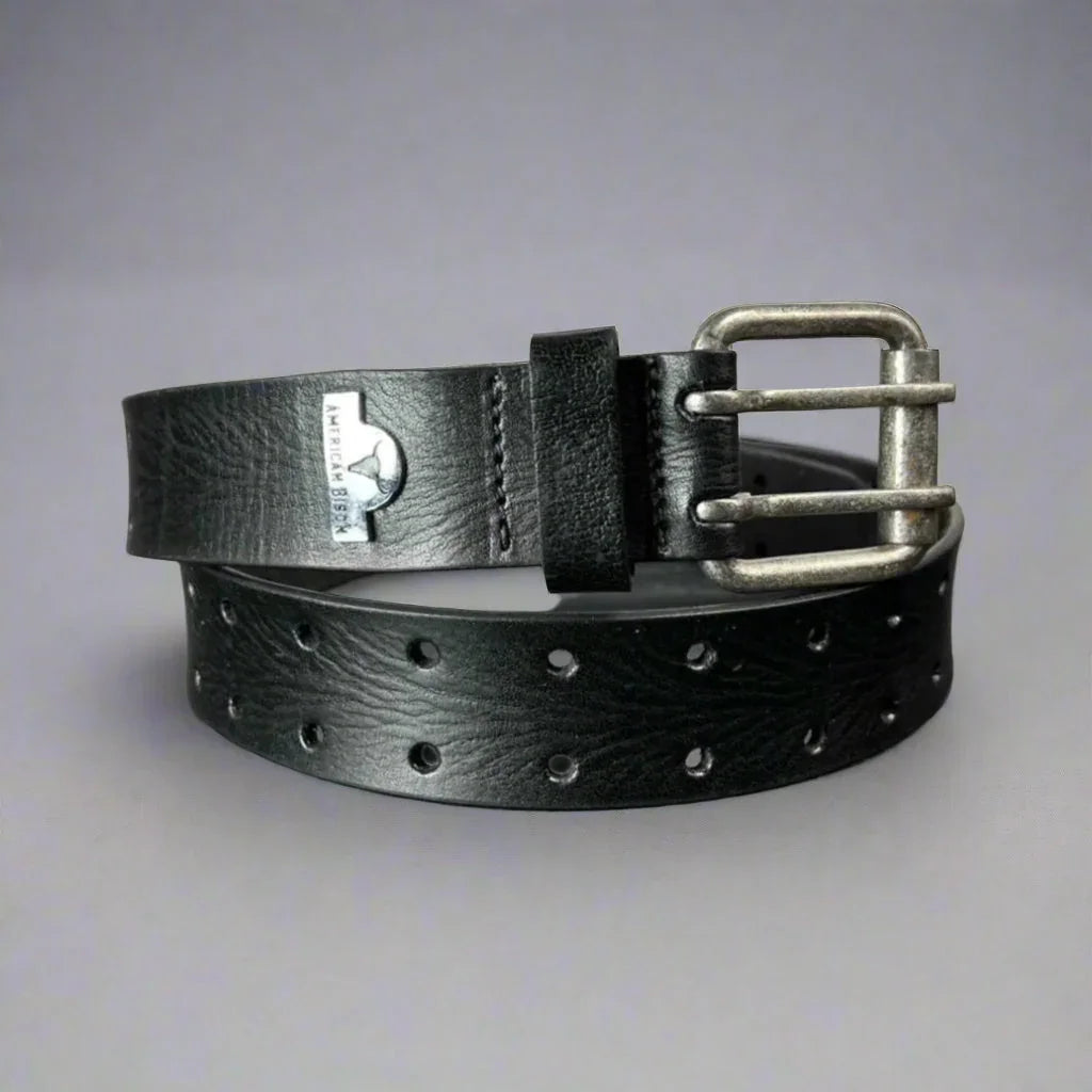 Black leather belt with silver buckle and American Bison logo on gray background