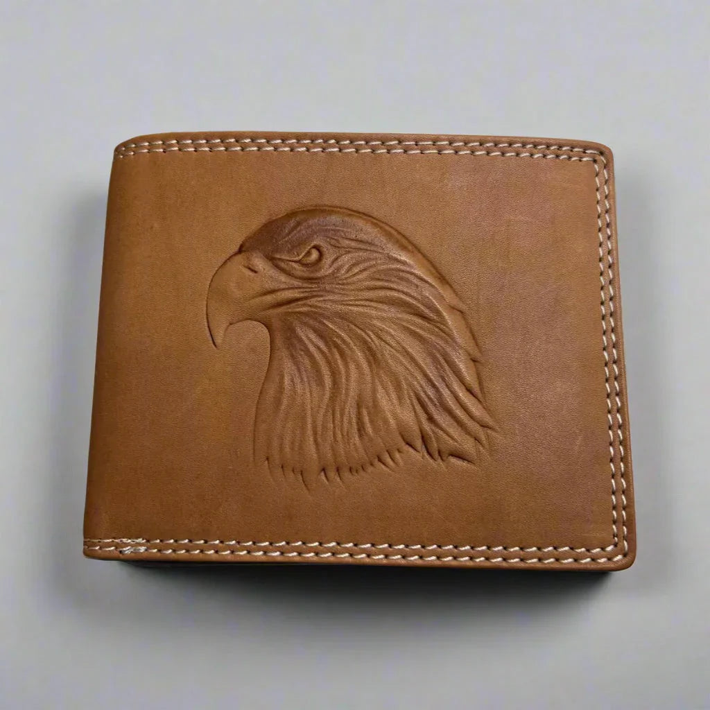 Brown leather wallet with embossed eagle head design and white stitching