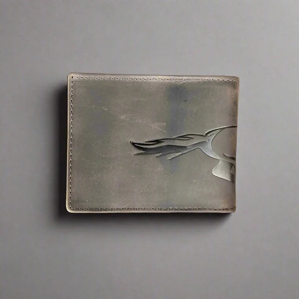 Gray leather wallet with embossed flame design on plain background