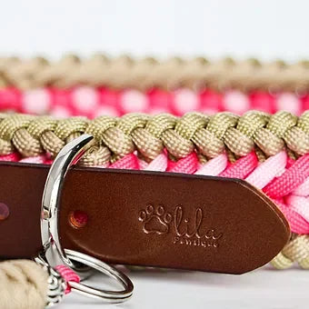 Handmade braided dog collar with pink, beige, and brown leather tag, silver ring buckle.