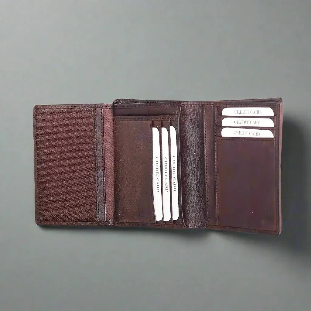 Men's upright brown leather wallet open showing multiple credit card slots on plain background