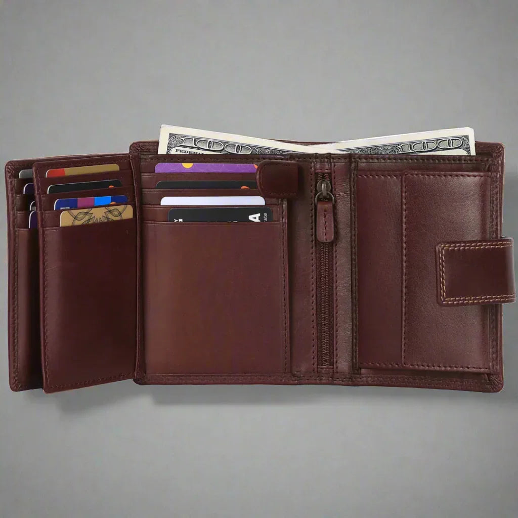 Open brown leather wallet with multiple card slots, cash compartment, and zipper pocket