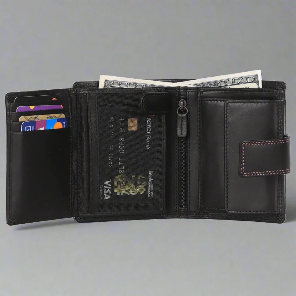 Open black leather wallet with cash, credit cards, and zippered pocket on gray background.