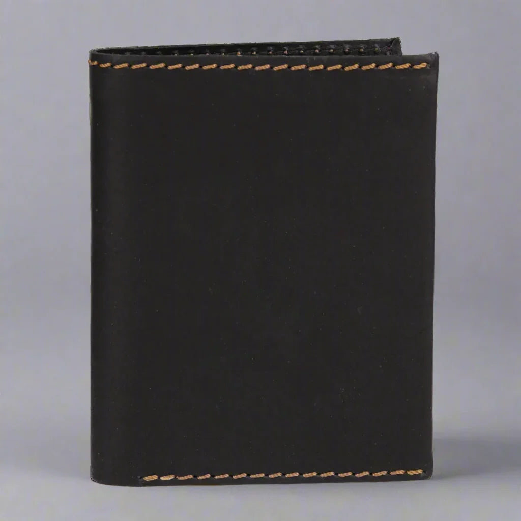 Black leather wallet with tan stitching on a plain gray background