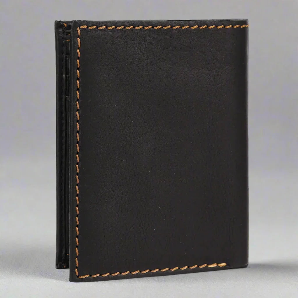 Black leather wallet with tan stitching on gray background