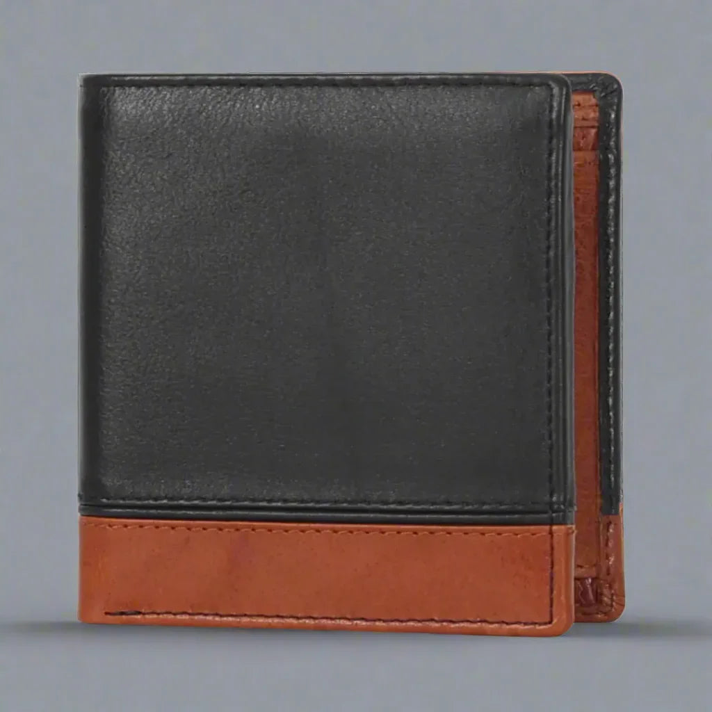 Black and brown leather bifold wallet on plain gray background