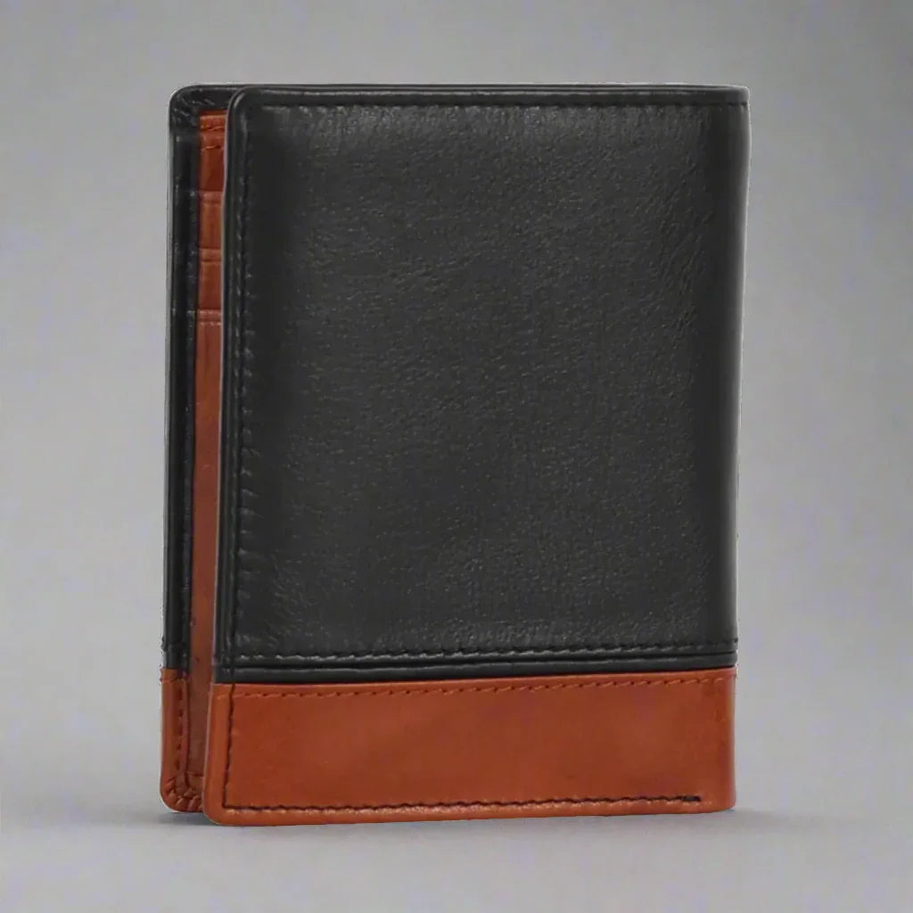 Black and brown leather bifold wallet standing upright on a grey background