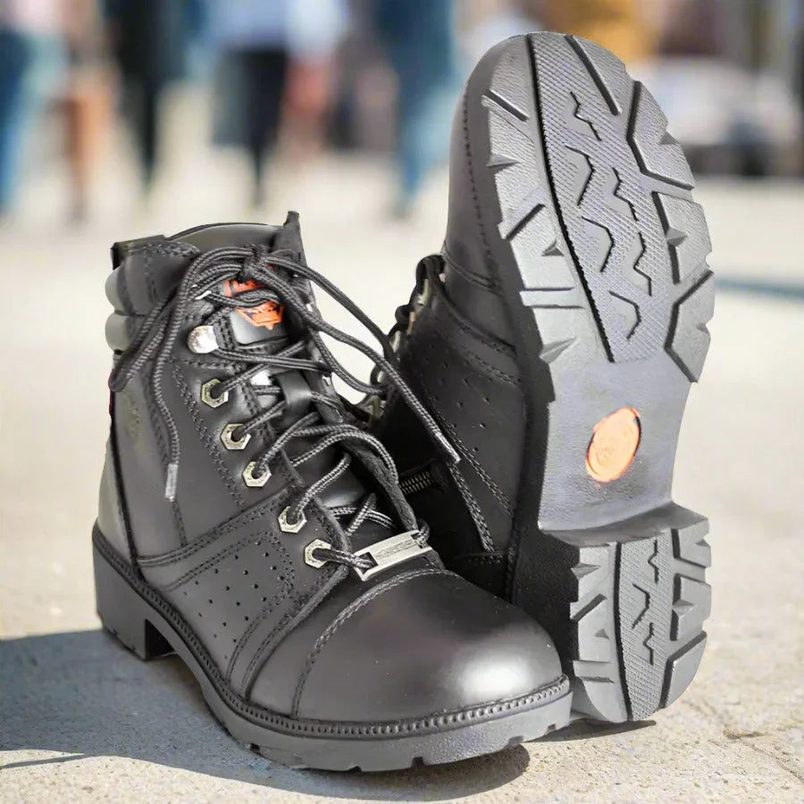 Black Milwaukee Leather women's side-zip lace-up motorcycle boots on sidewalk