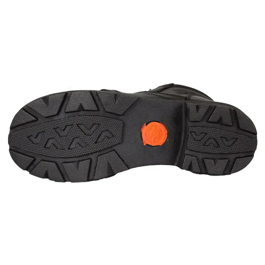 Black rubber sole of women's motorcycle boot with tread and orange circular detail