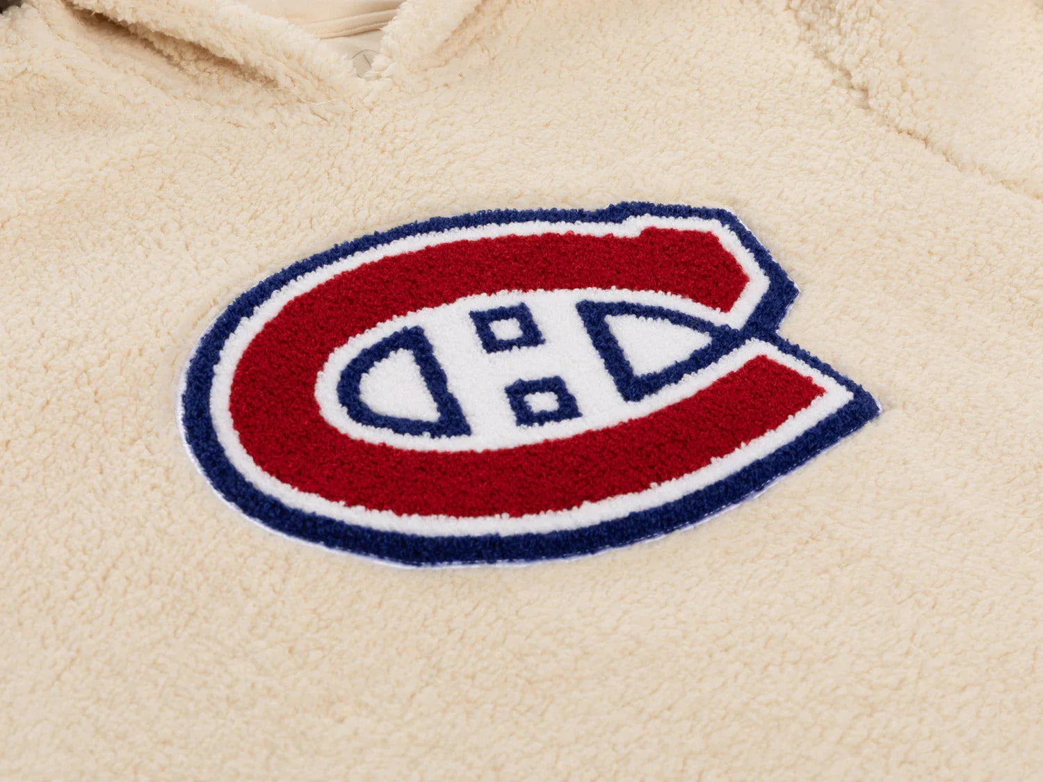 Montreal Canadiens logo on beige sherpa fleece hoodie