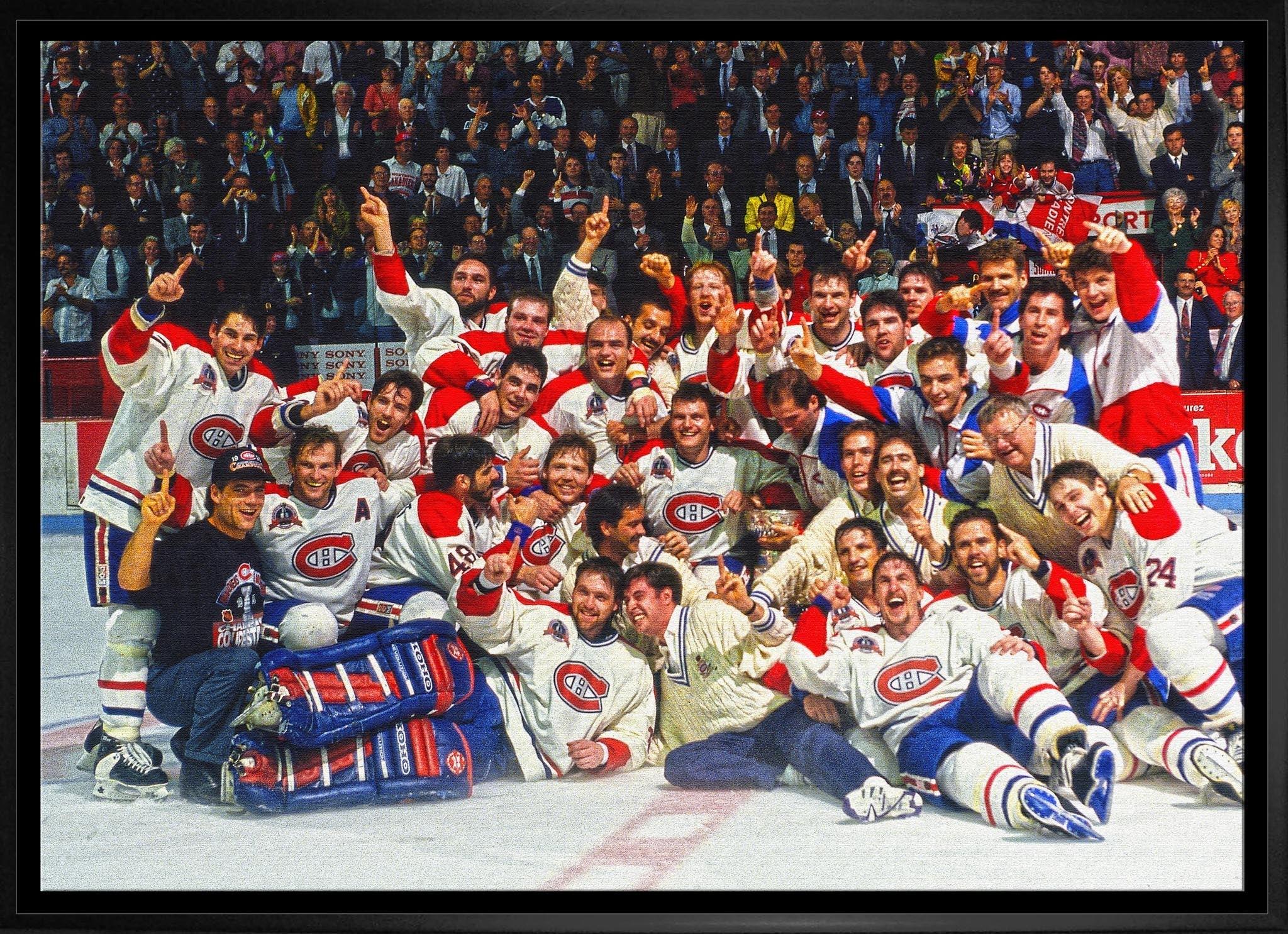 Montreal Canadiens hockey team celebrating on ice in front of cheering crowd