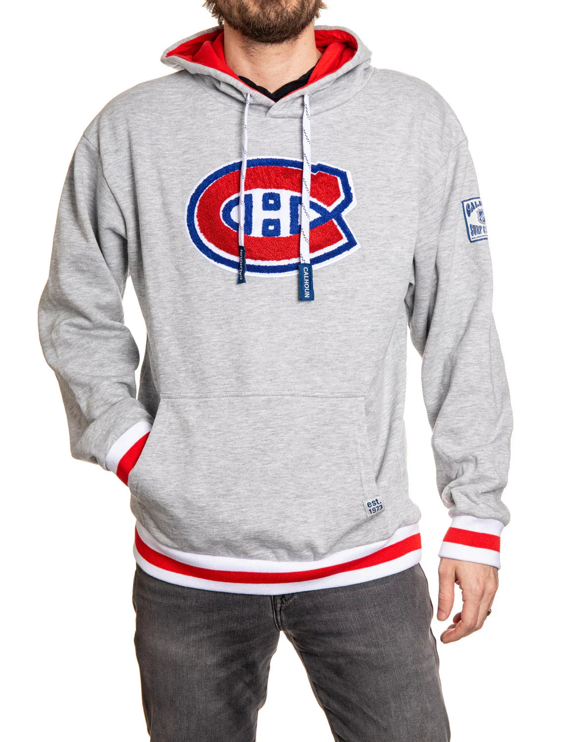 Man wearing grey Montreal Canadiens chenille hoodie with red and white trim