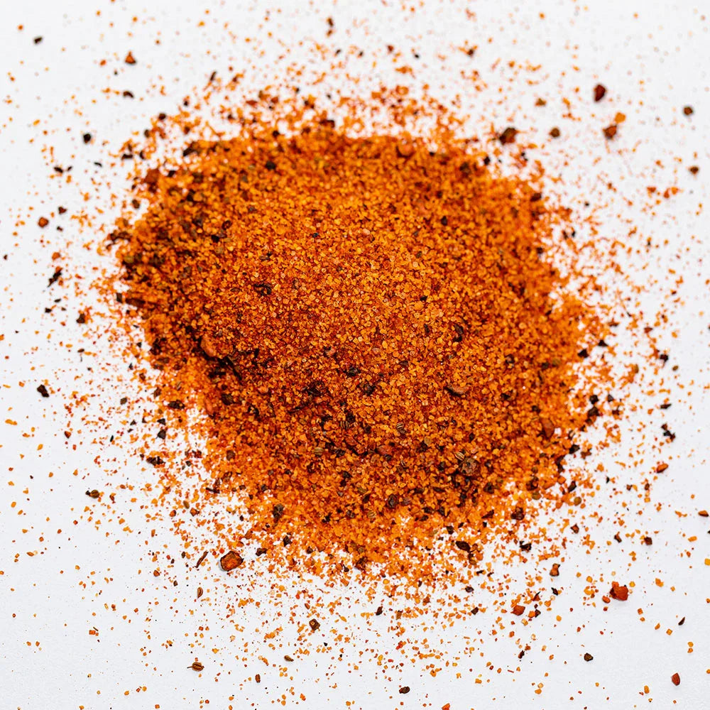 Pile of maple seasoning spice blend on white background