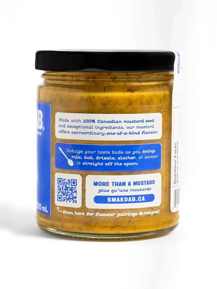 Jar of Smak Dab mustard with blue label, black lid, and visible mustard seeds, Canadian product