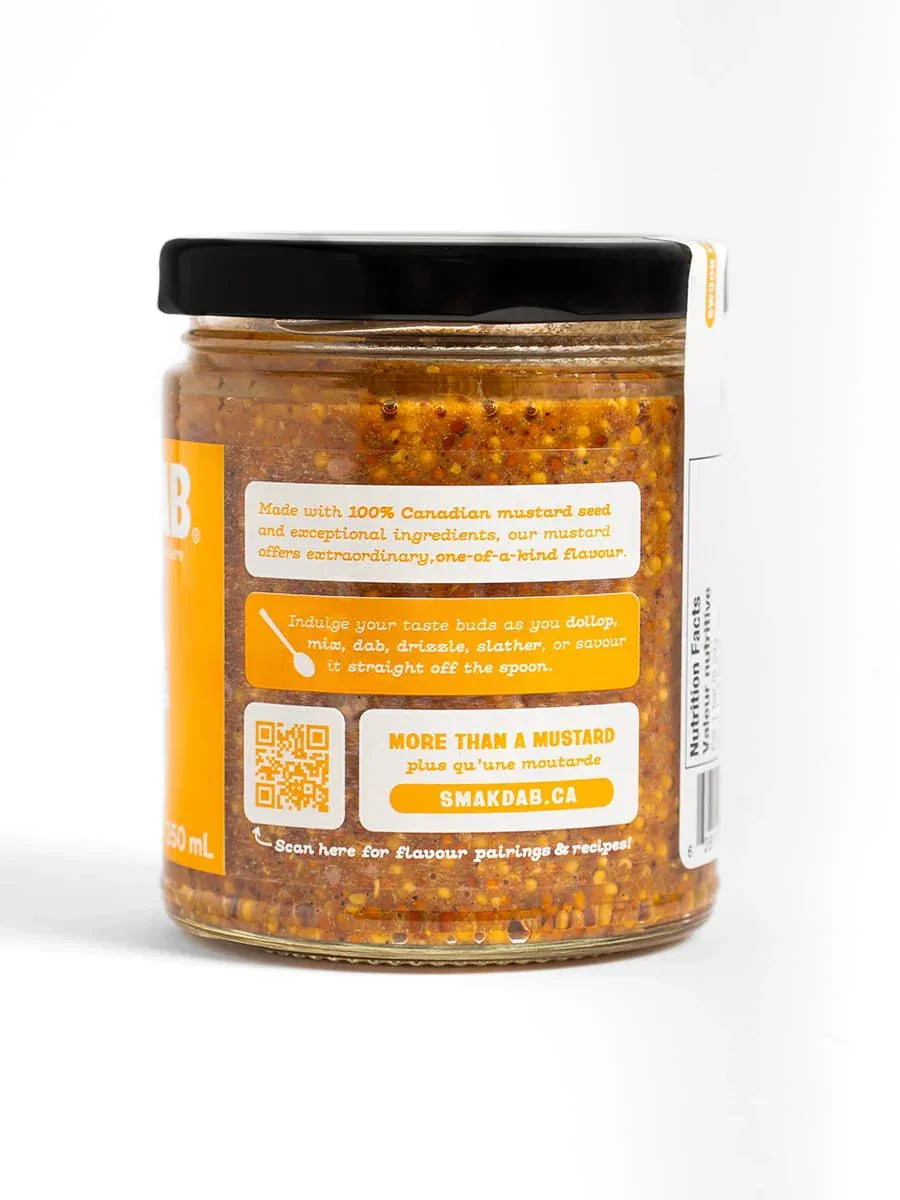 Jar of Smak Dab Canadian grainy mustard with black lid on white background