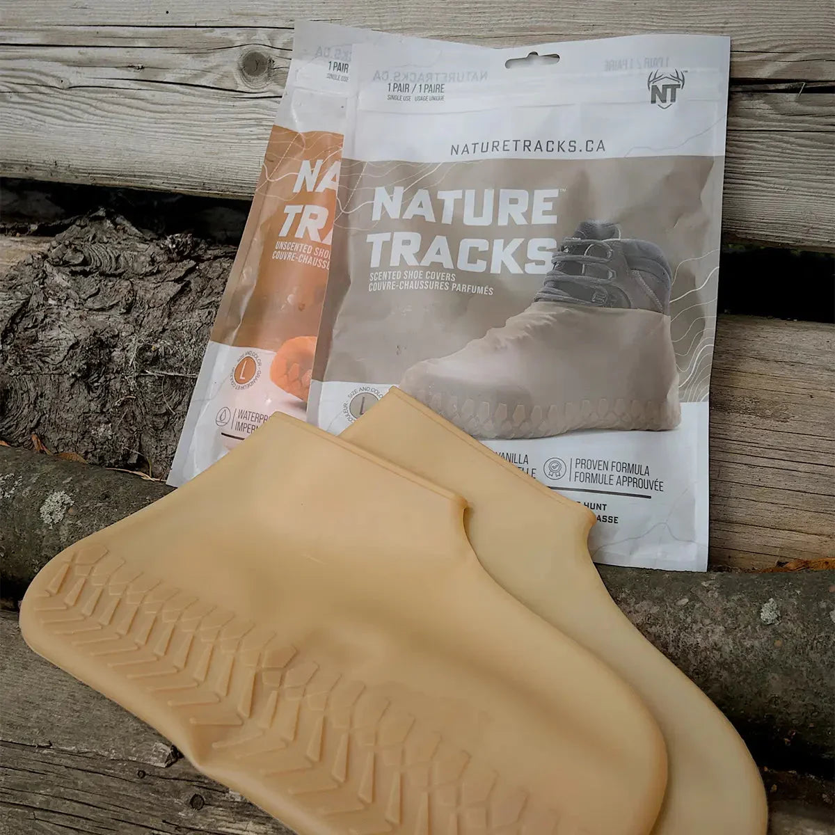 Nature Tracks waterproof scented shoe covers in beige, shown outdoors with packaging