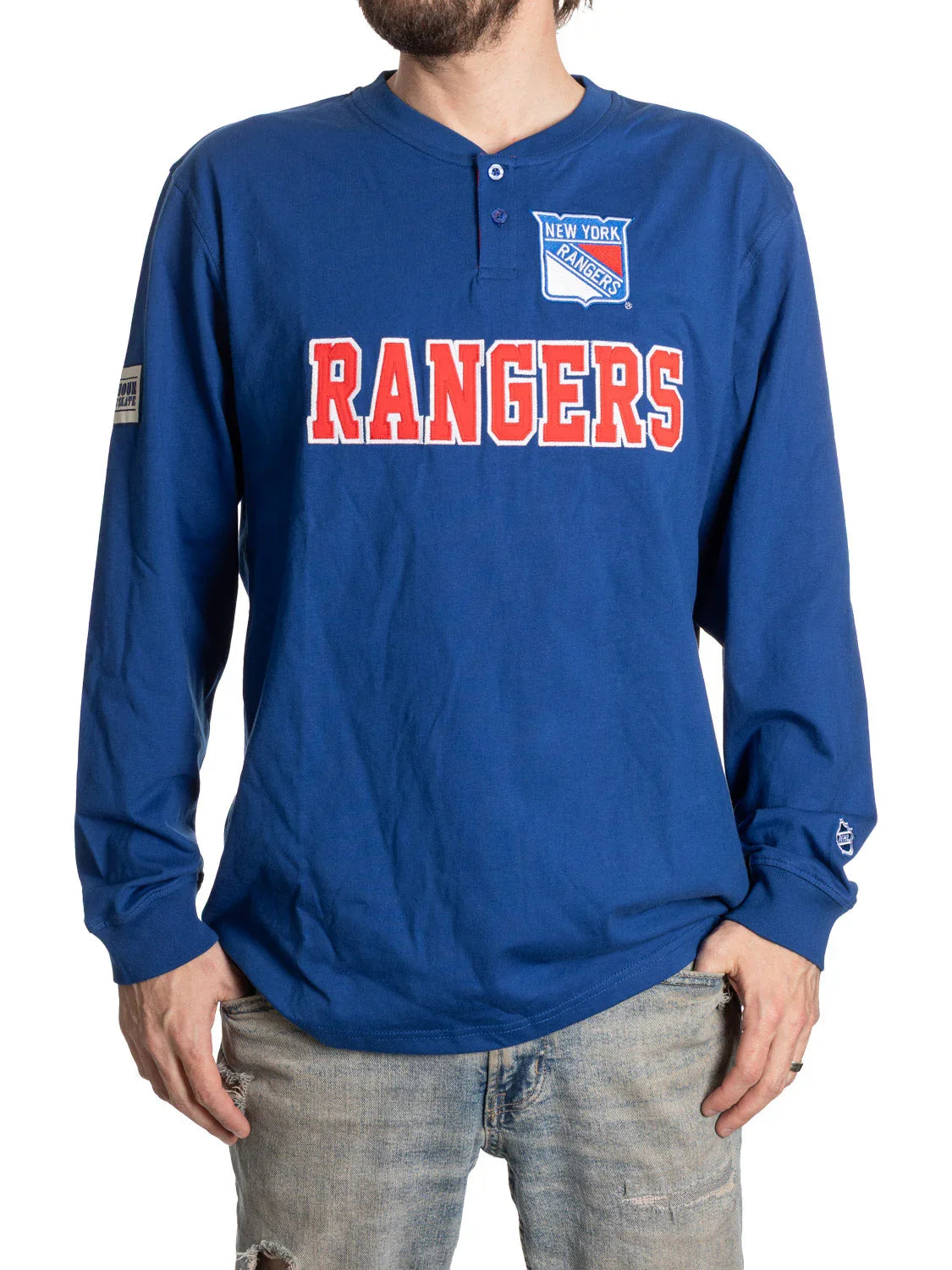 Man wearing blue New York Rangers long sleeve henley shirt with bold red Rangers logo