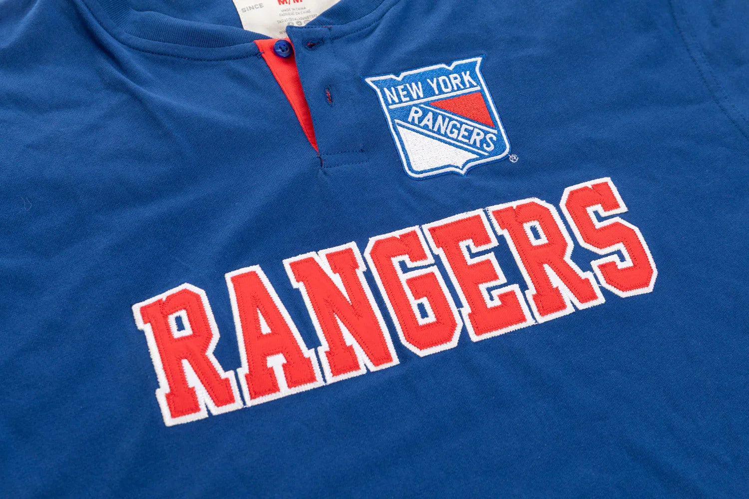 Blue New York Rangers henley shirt with embroidered logo and RANGERS text