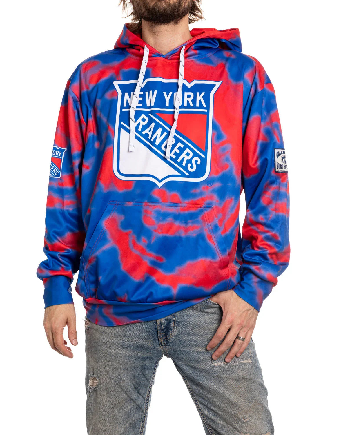 New York Rangers tie-dye hoodie in blue and red, worn with ripped jeans