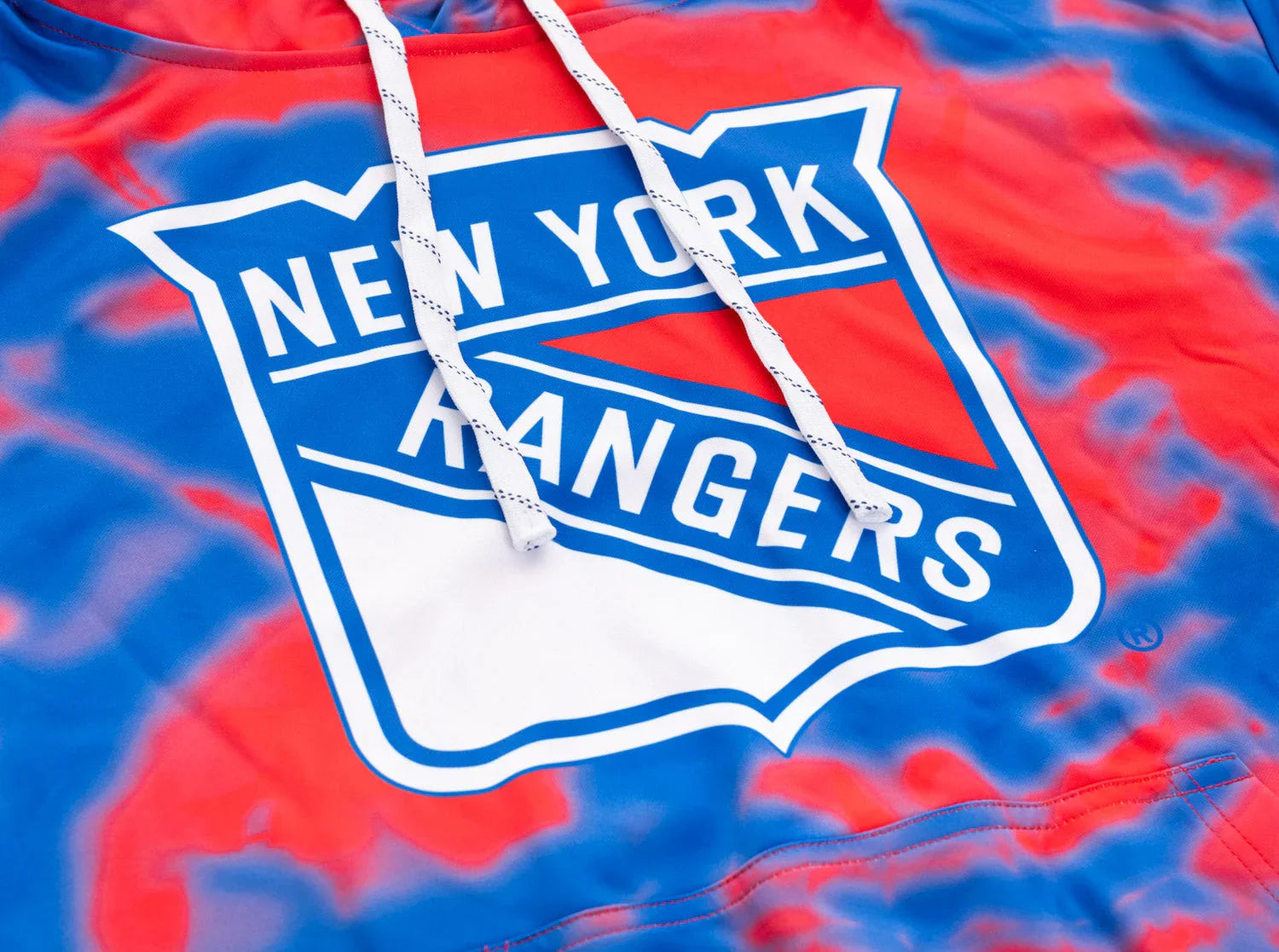 New York Rangers logo on red and blue tie-dye sublimation hoodie with white drawstrings