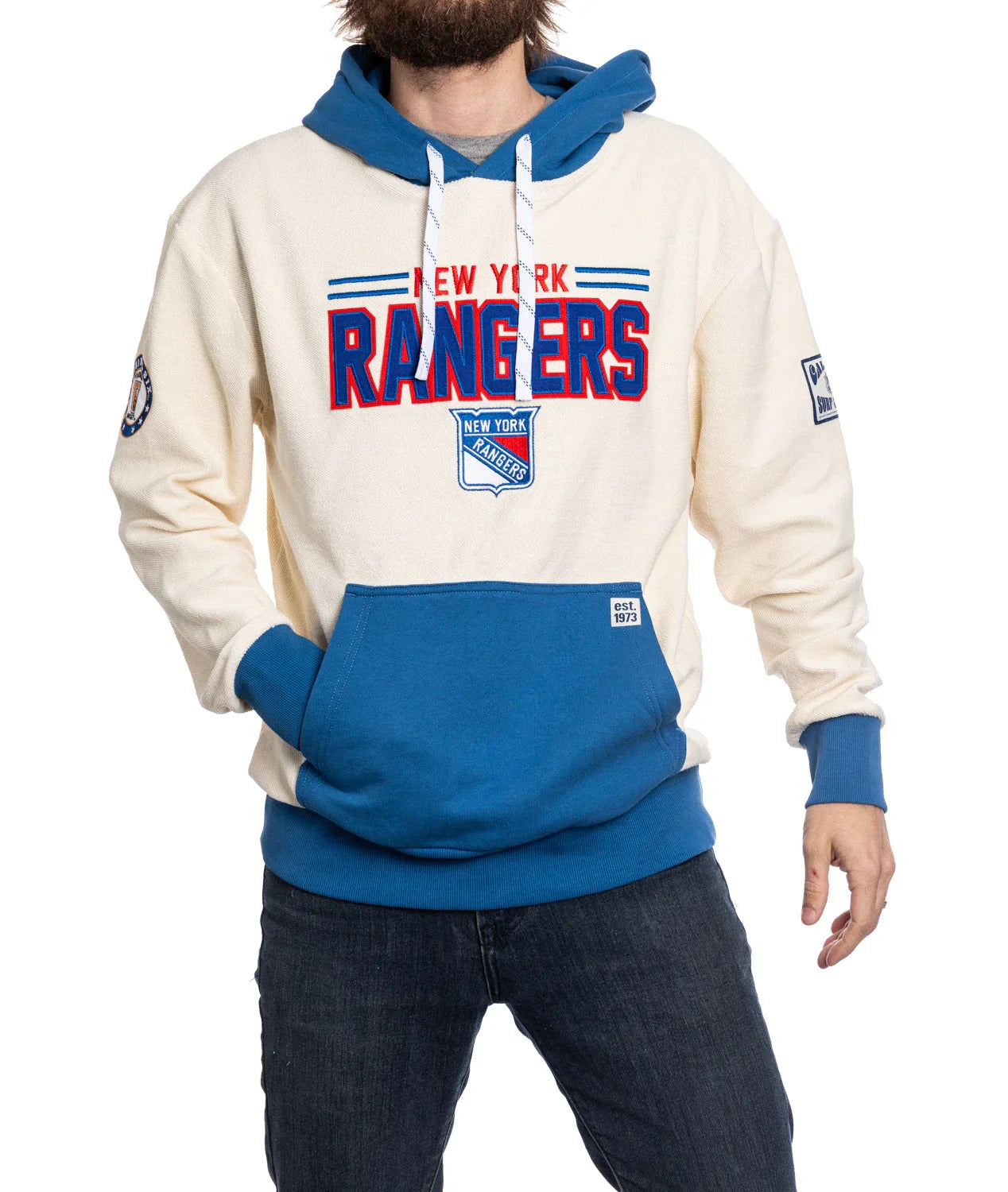 New York Rangers cream and blue hoodie with logo and patches, worn by male model