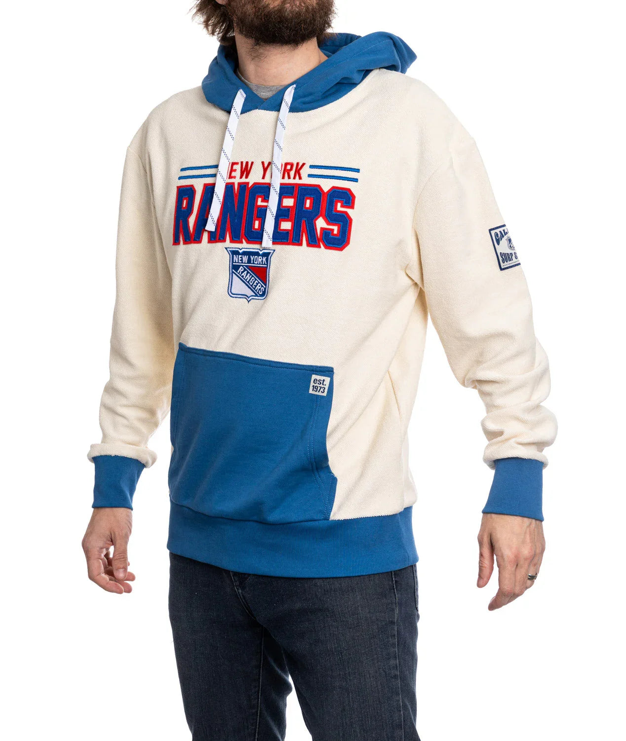 Man wearing New York Rangers reverse retro hoodie with blue hood and front pocket