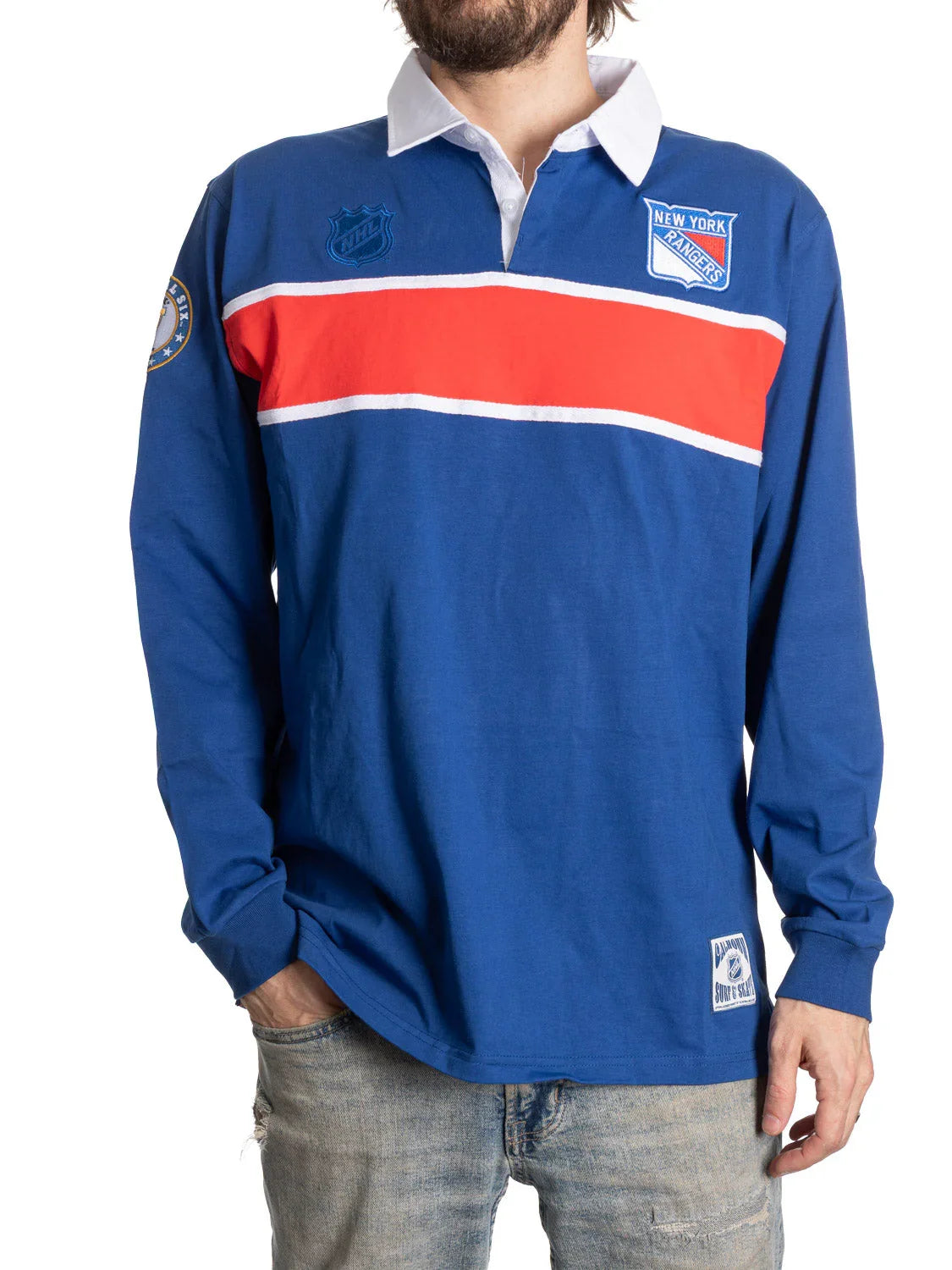 Man wearing blue New York Rangers rugby shirt with red stripe and NHL logo