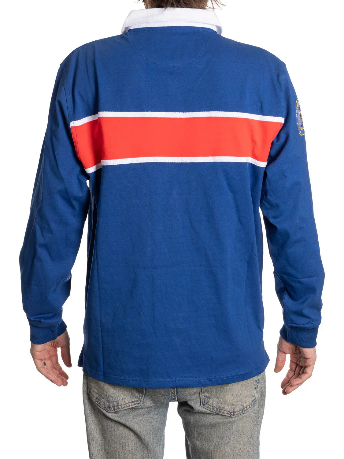 Back view of blue rugby shirt with white collar and red stripe, casual wear