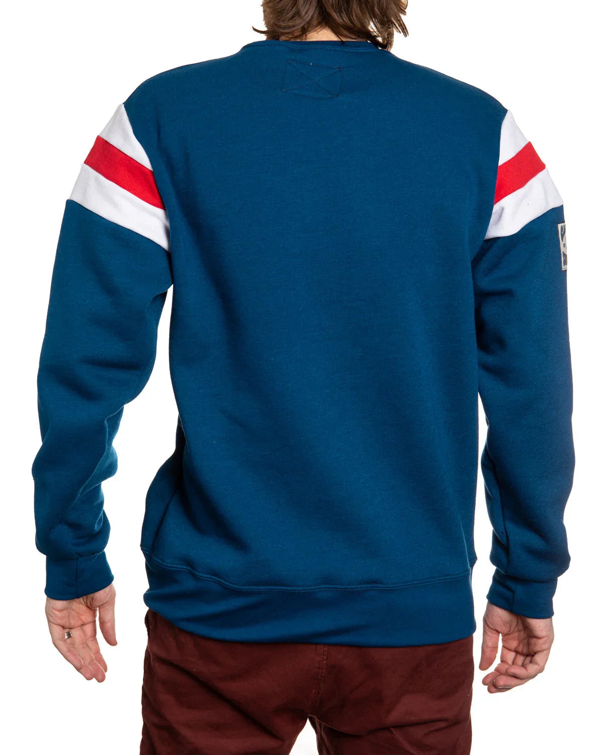 Back view of man in blue sweatshirt with red and white stripes, casual fashion
