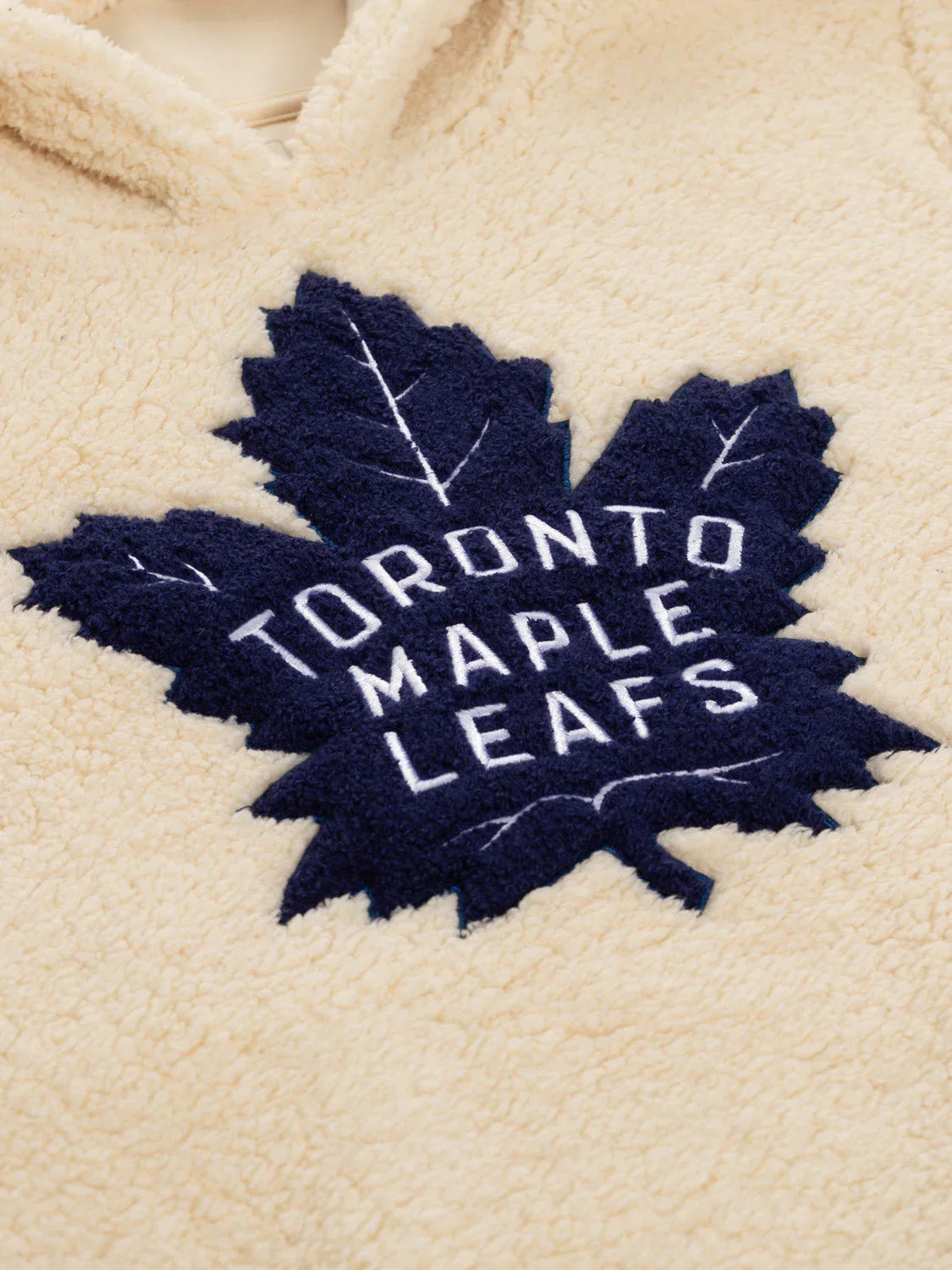 Toronto Maple Leafs navy logo on cream sherpa fleece hoodie