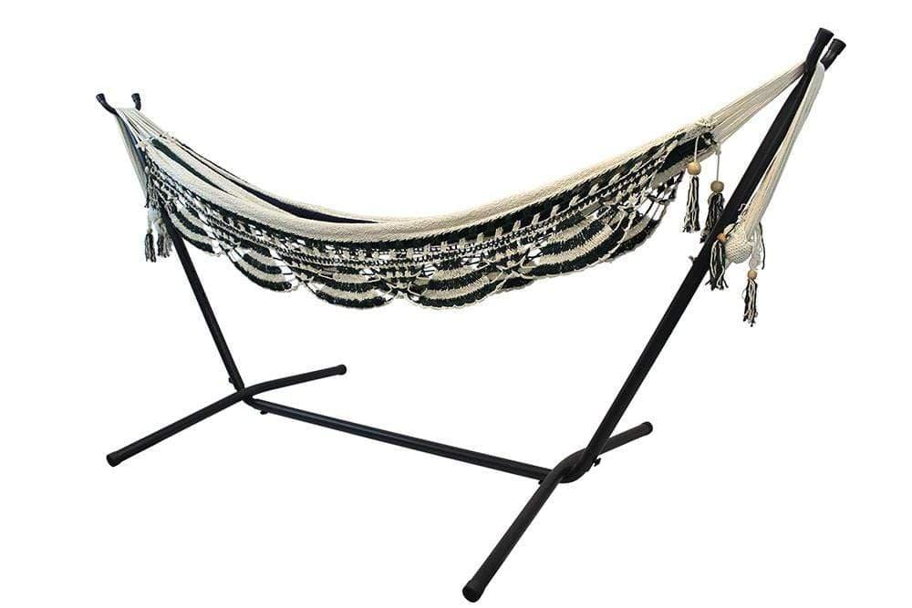 Nicaraguan hammock with decorative fringe on a black universal metal stand