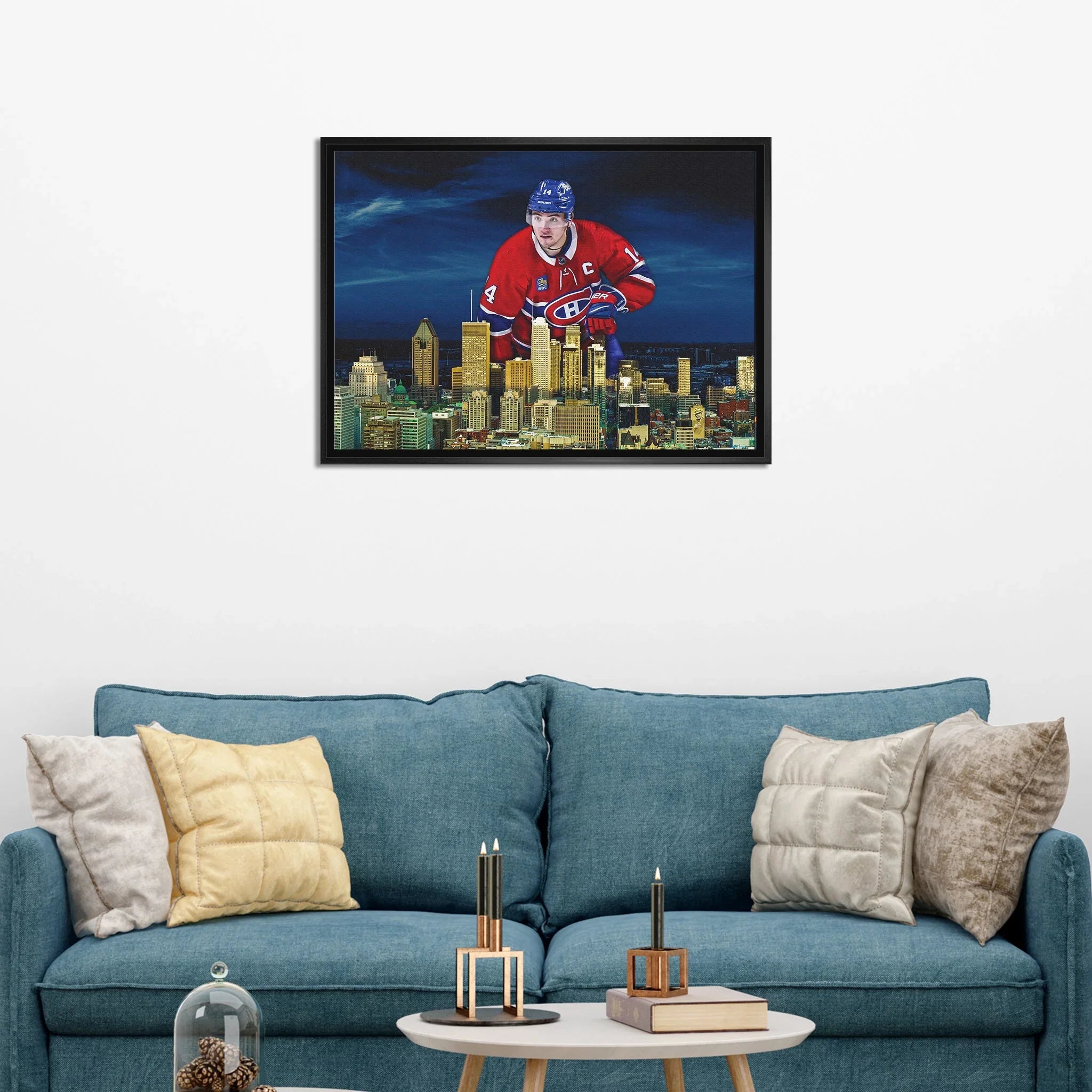 Framed Montreal Canadiens hockey art over blue sofa in modern living room