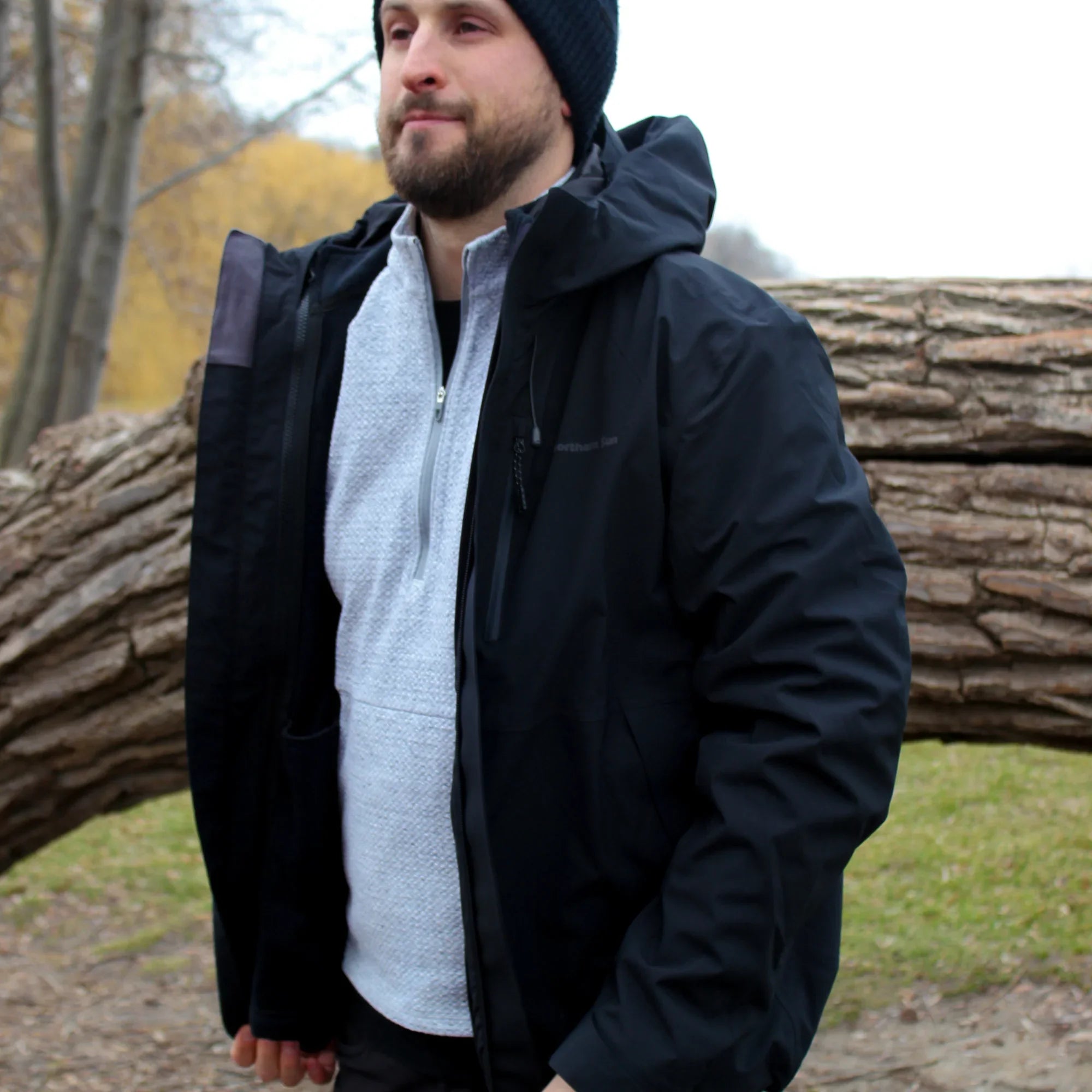 Man outdoors wearing Northern Sun 3-in-1 men's Canada waterproof winter jacket, black