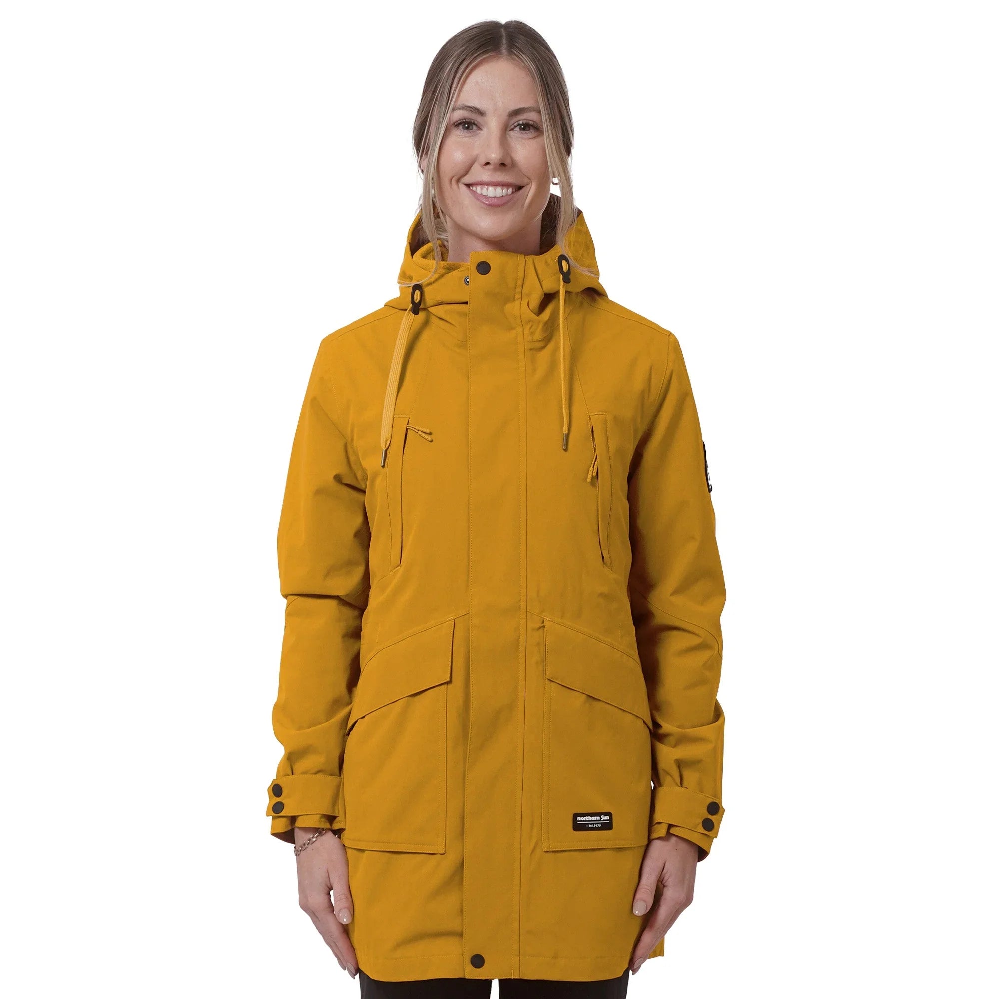 Woman wearing yellow mid-length 3-in-1 parka jacket with hood, front view