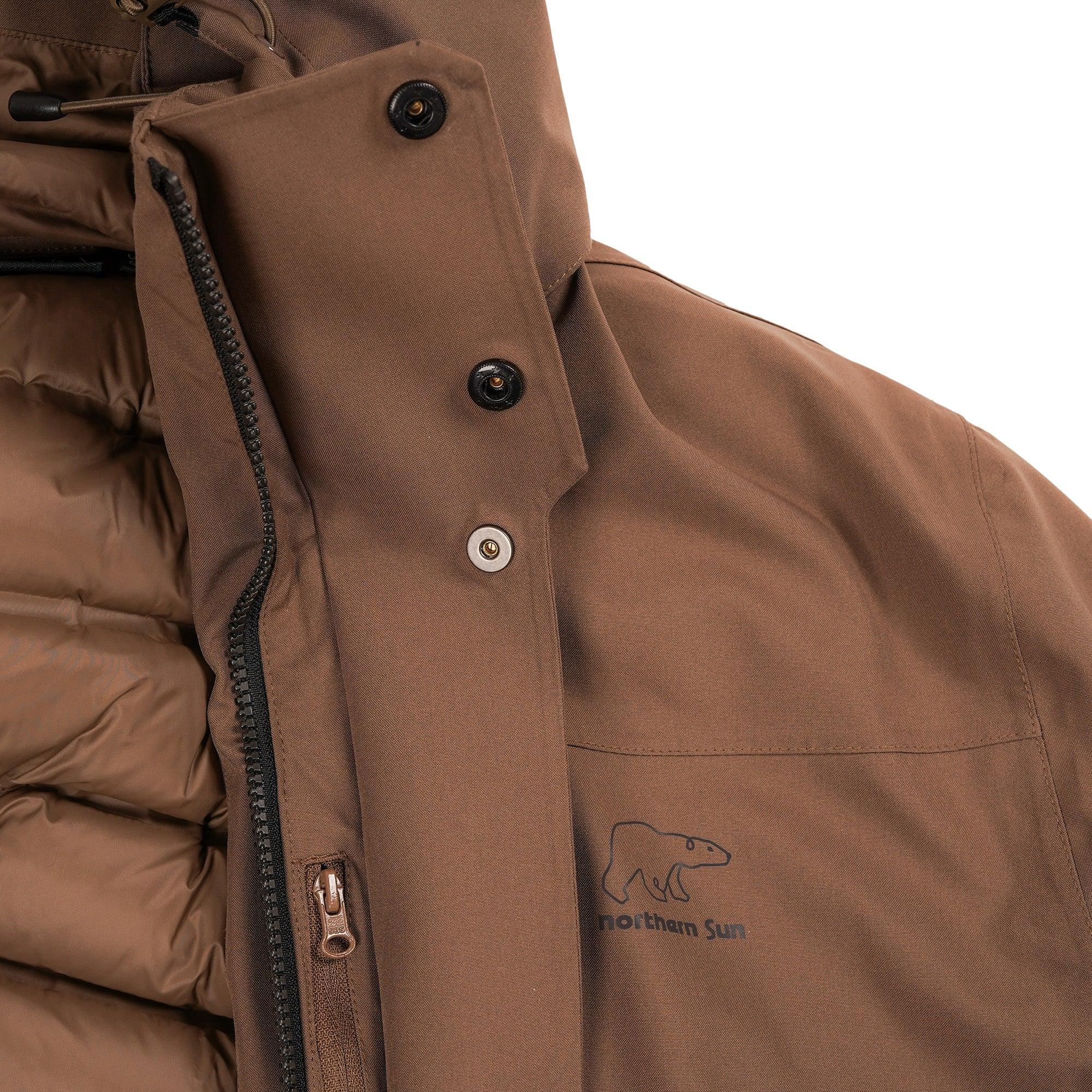 Brown Northern Sun winter jacket with zipper, button closure, and bear logo detail
